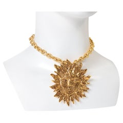 Vintage YSL Yves Saint Laurent Spilla con ciondolo a forma di sole su catena, circa 1980