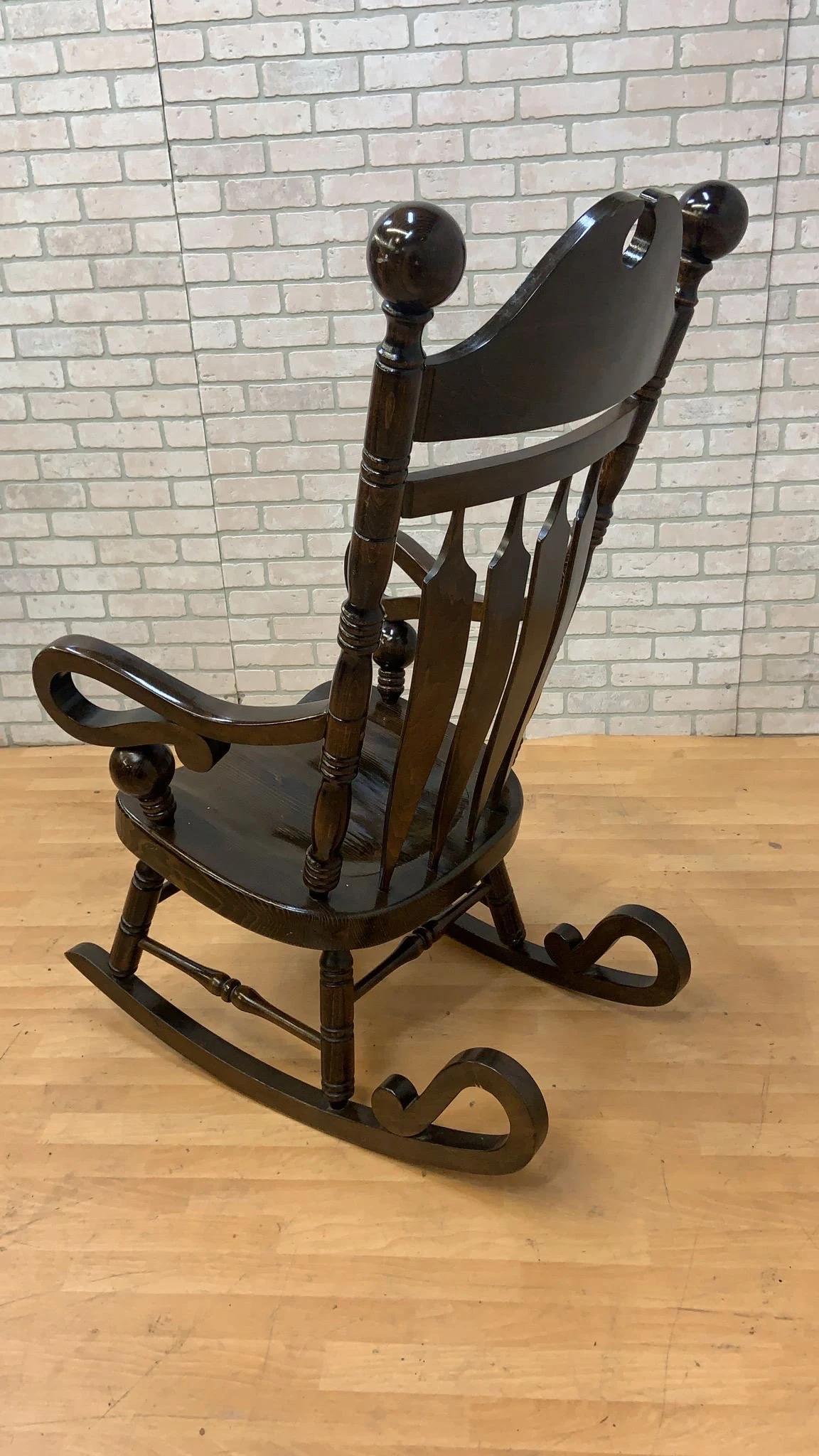 Vintage Yugoslavian High Back Wood Rocking Chair

This vintage high back wood rocking chair combines timeless elegance with exceptional craftsmanship, making it a perfect addition to any home. The piece features elegantly carved wood.

