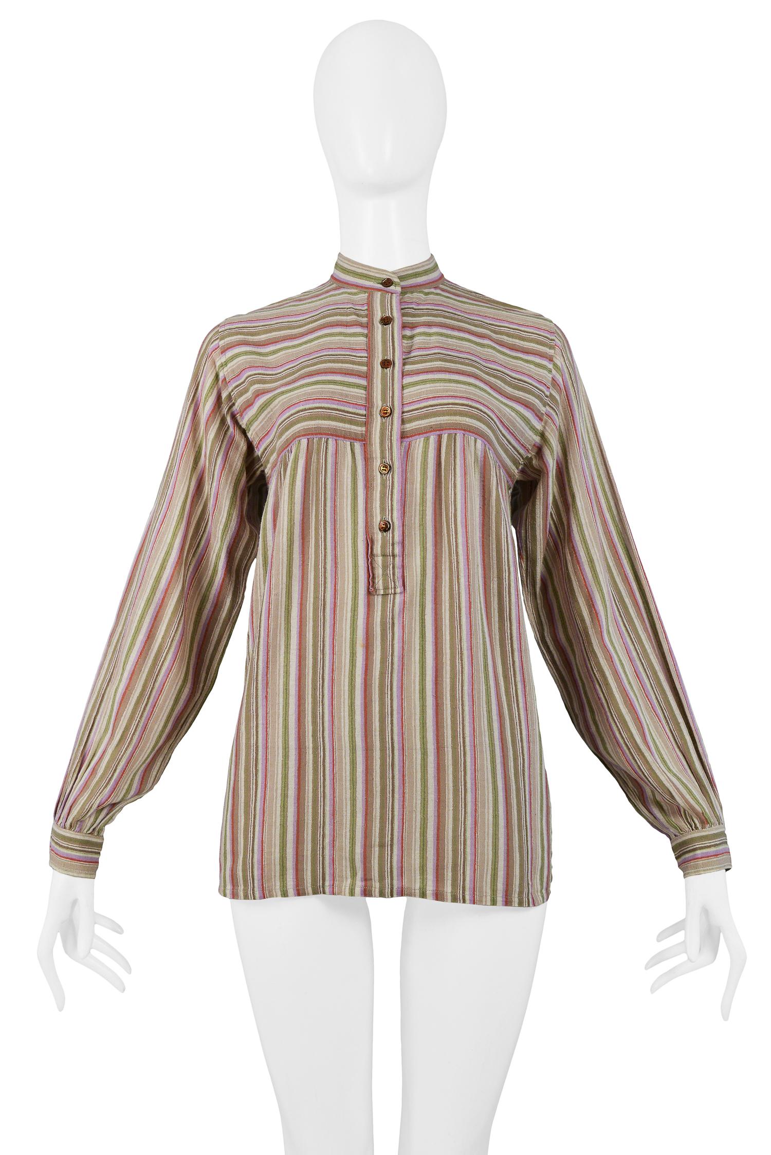 Resurrection Vintage is excited to offer a vintage Yves Saint Laurent brown stripe cotton blouse featuring button front placket, high collar, and button cuff detailing at wrists.

Yves Saint Laurent
Size 36
Cotton
Excellent Vintage