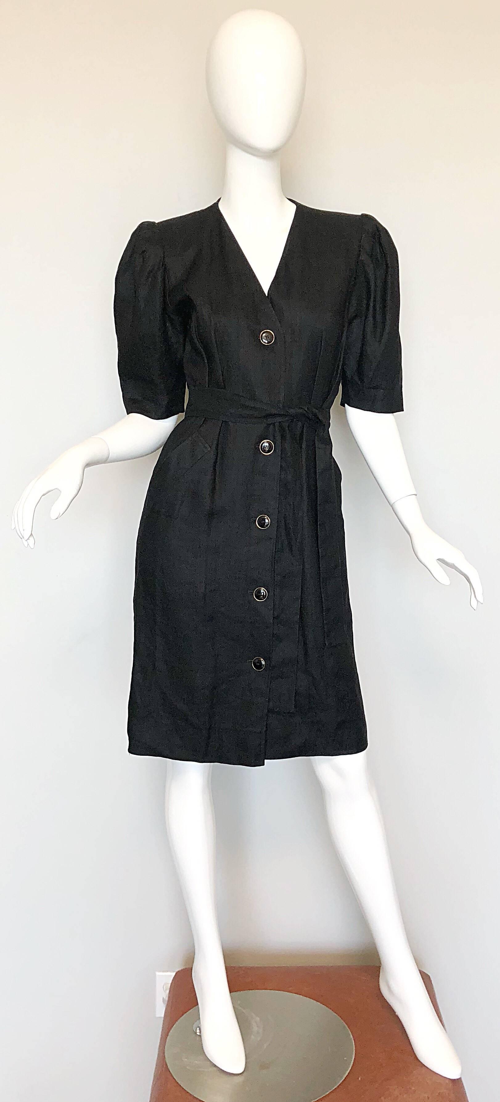 Chic vintage YVES SAINT LAURENT Rive Gauche 1980s short sleeve black linen dress! Features black and gold buttons down the entire front, with a hidden hook-and-eye closure at inner waist. Detachable sash belt, and POCKETS at each side of the hips.