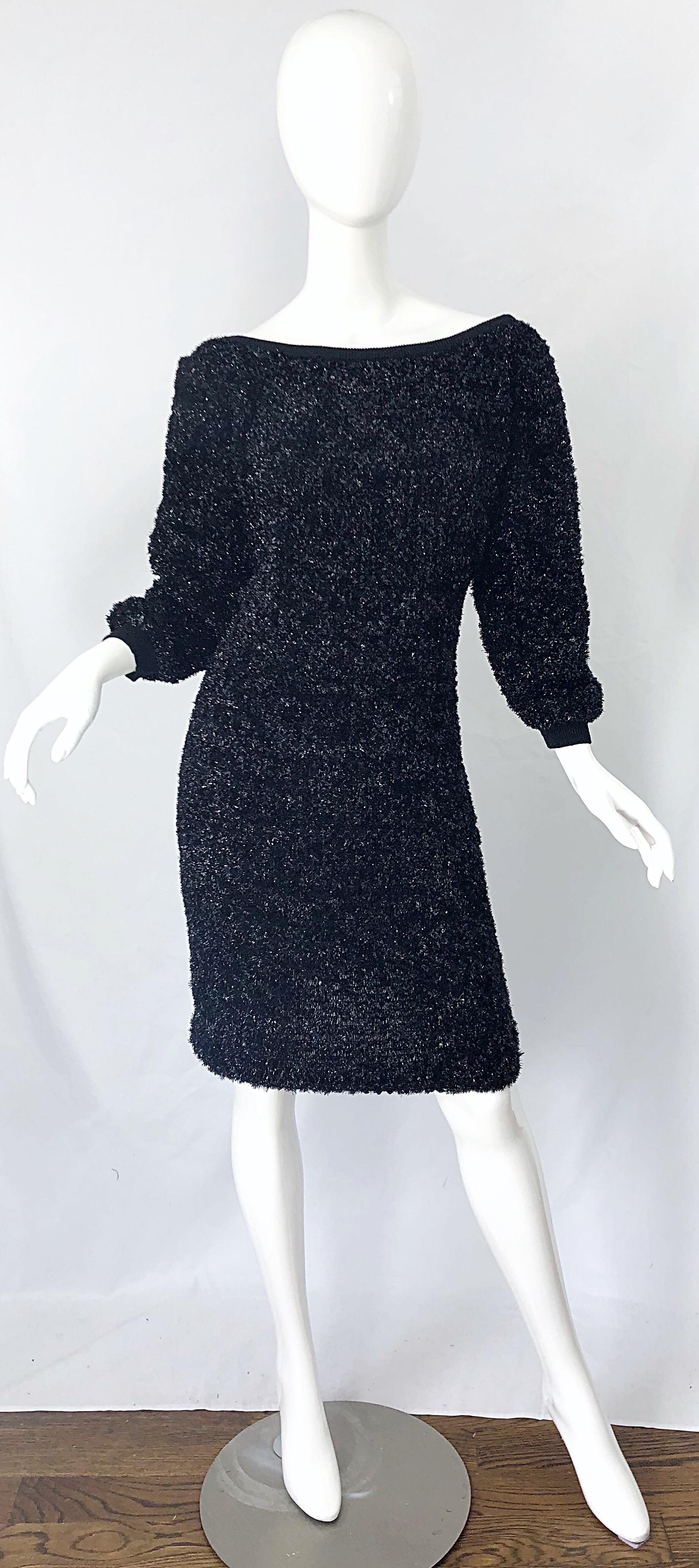 Gorgeous vintage early 90s YVES SAINT LAURENT YSL Rive Gauche off the shoulder metallic tinsel sweater dress ! At first glance, this looks like a sequined dress. However, it is really black metallic tinsel. Slight off the shoulder fit with a deep
