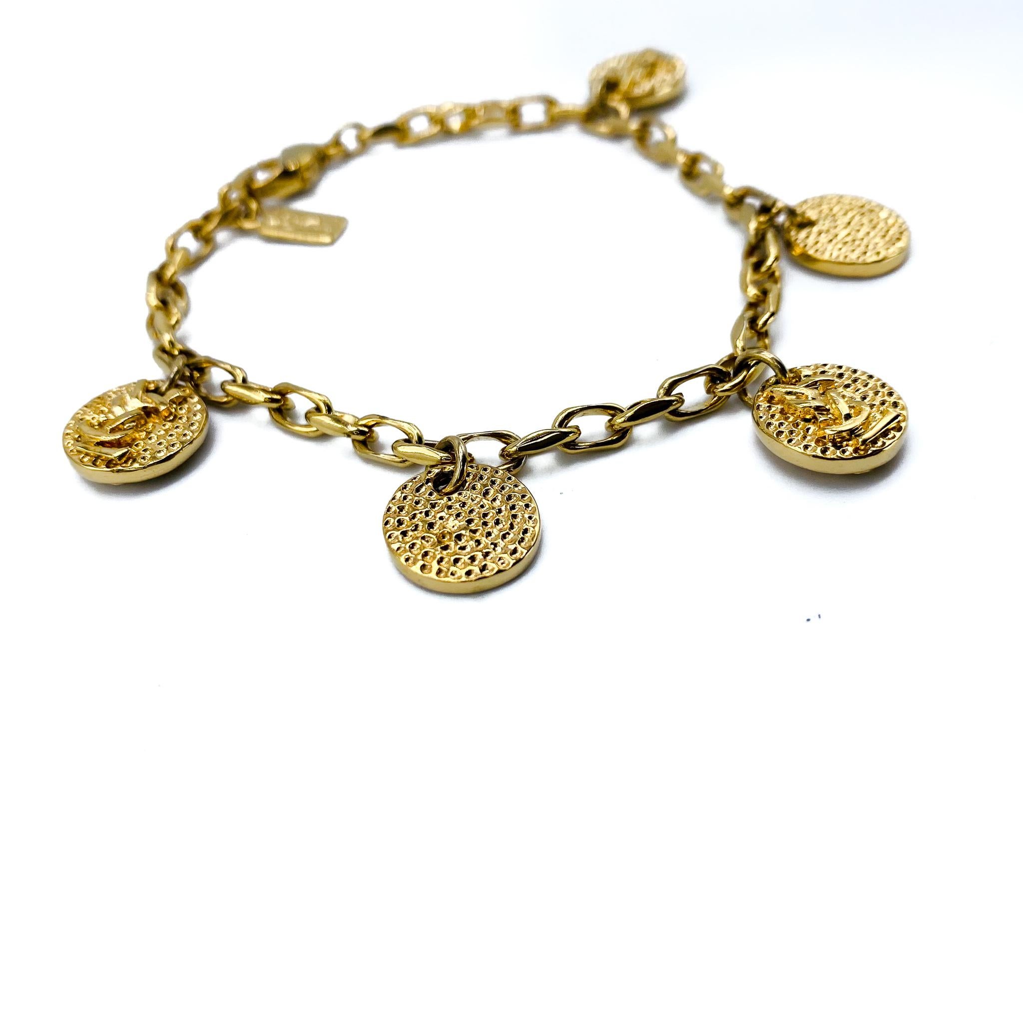 Vintage Yves Saint Laurent 1990s Gold Plated Charm Bracelet In Excellent Condition In London, GB