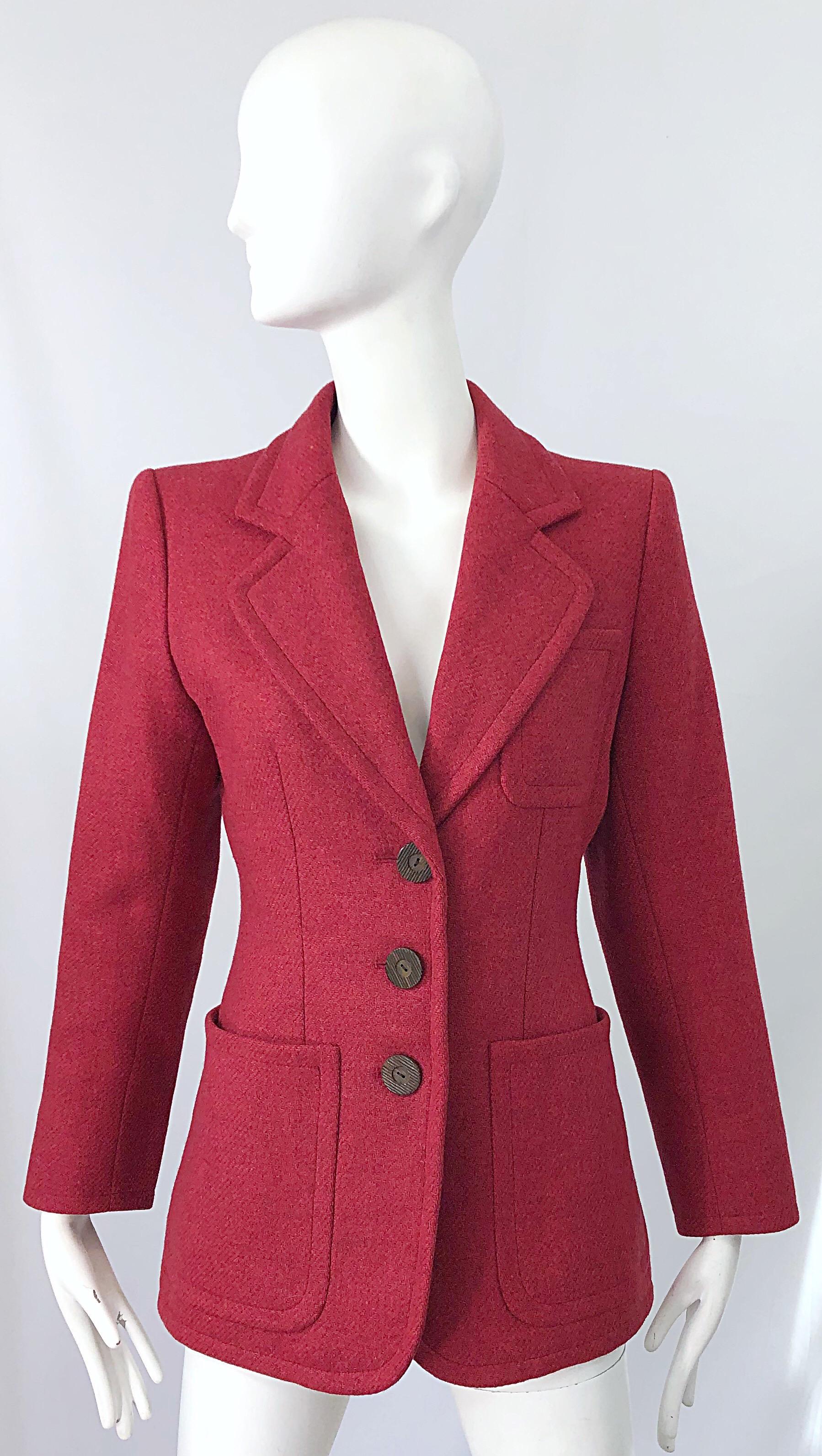 Stylish and timeless vintage 90s YVES SAINT LAURENT Rive Gauche raspberry pink tailored blazer jacket ! Features the perfect pink color that is great anytime of year. Classic Saint Laurent lapels that are reminiscent of his designs from the 70s.