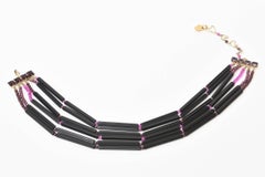 Collier Vintage Yves Saint Laurent en verre noir et violet 6 brins rare
