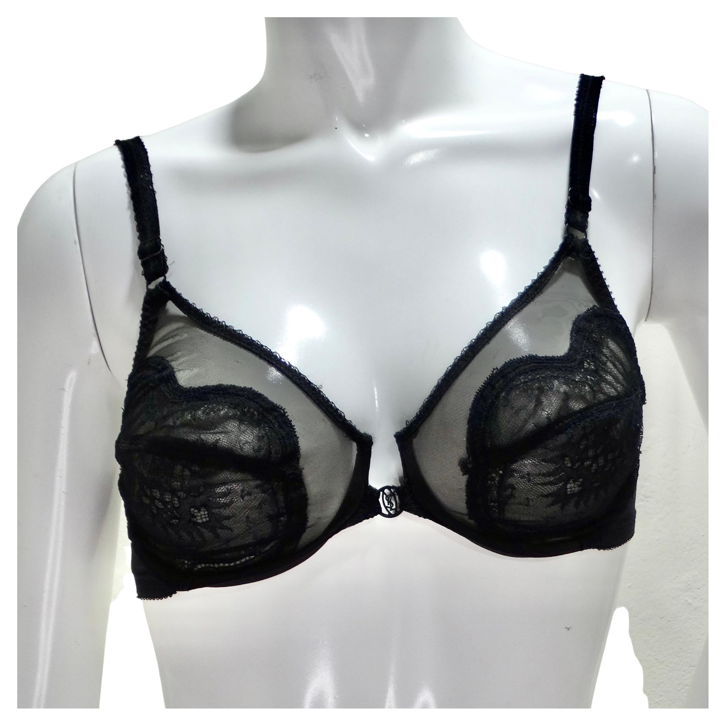 Step into a world of timeless elegance with this 1970s Yves Saint Laurent Black Lace Bra. Crafted with exquisite attention to detail, this classic style underwire bra features gorgeous black lace that exudes femininity and elegance. Indulge in the
