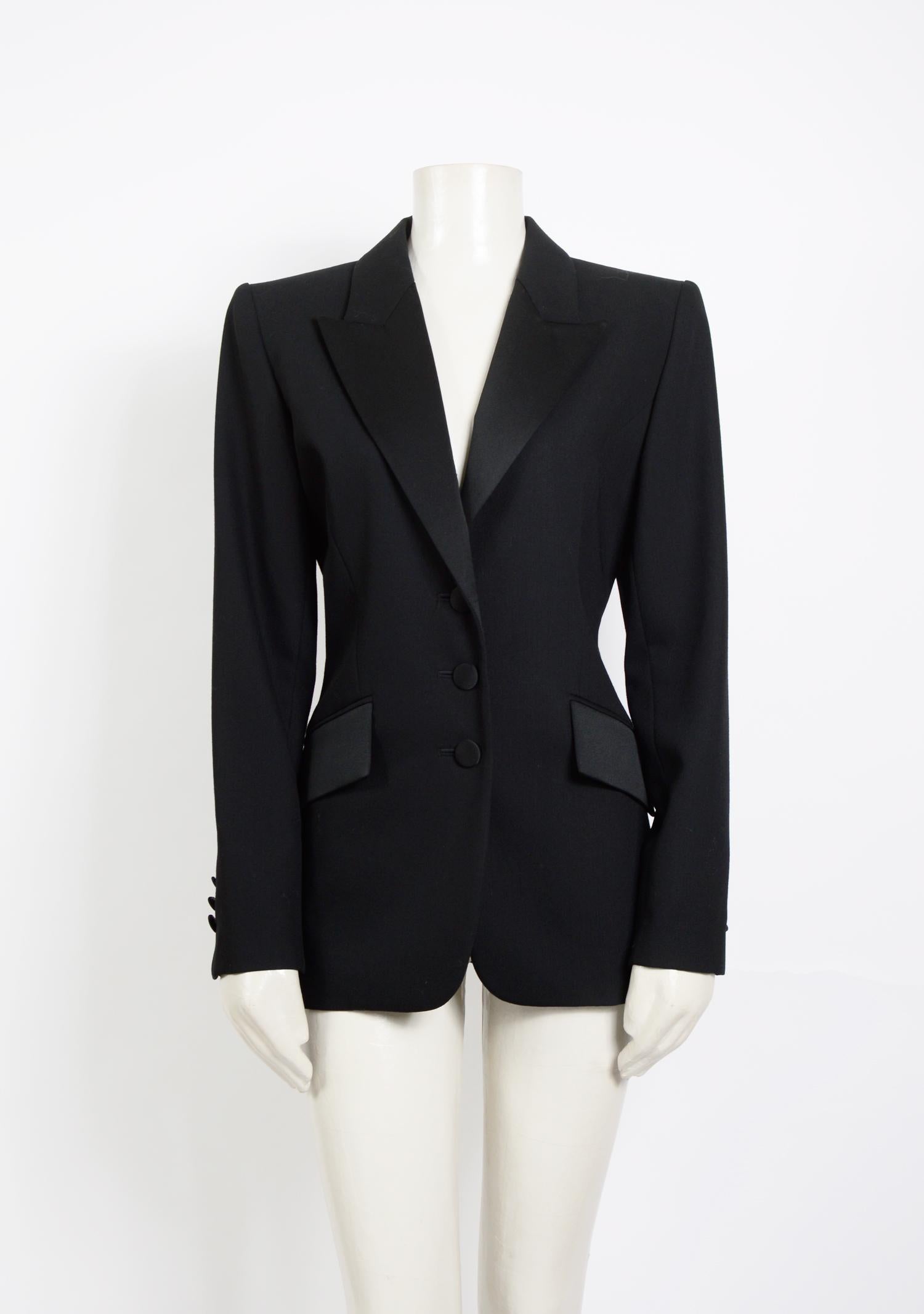Stunning Yves Saint Laurent black tuxedo/smoking jacket & skirt suit.
Made in France - French size 36 - Us size 4 - 100% wool and both pieces lined.
However, we strongly advise using the given measurements for the perfect fit.
Measurements are taken