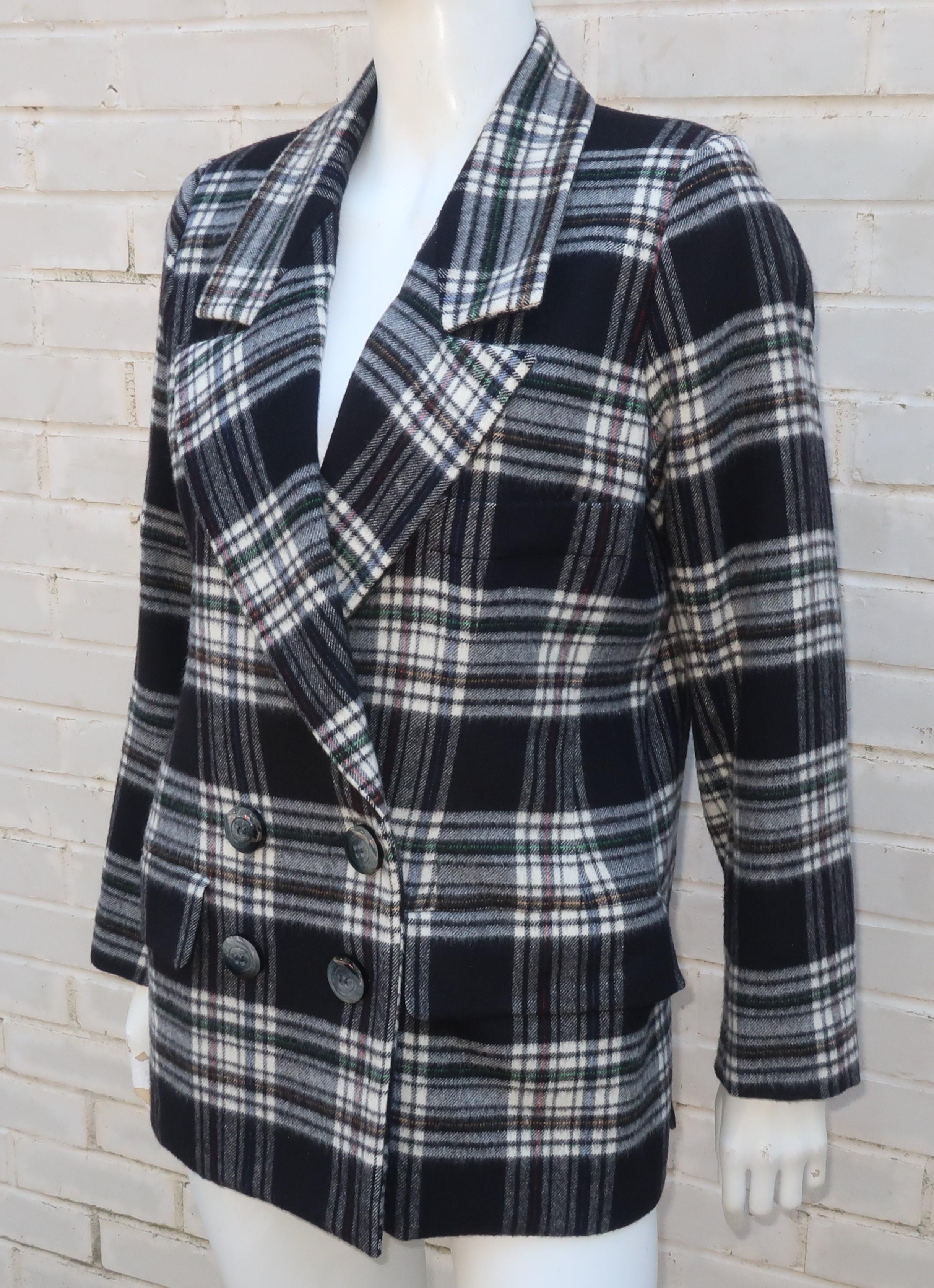 Yves Saint Laurent Rive Gauche plaid wool double breasted jacket in black & white with skinny stripes of red, blue and green.  The menswear style silhouette offers front flap pockets and a breast pocket with generous lapels.  The buttons, both at