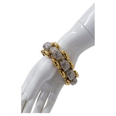 Vintage Yves Saint Laurent bracelet in gold-plated metal