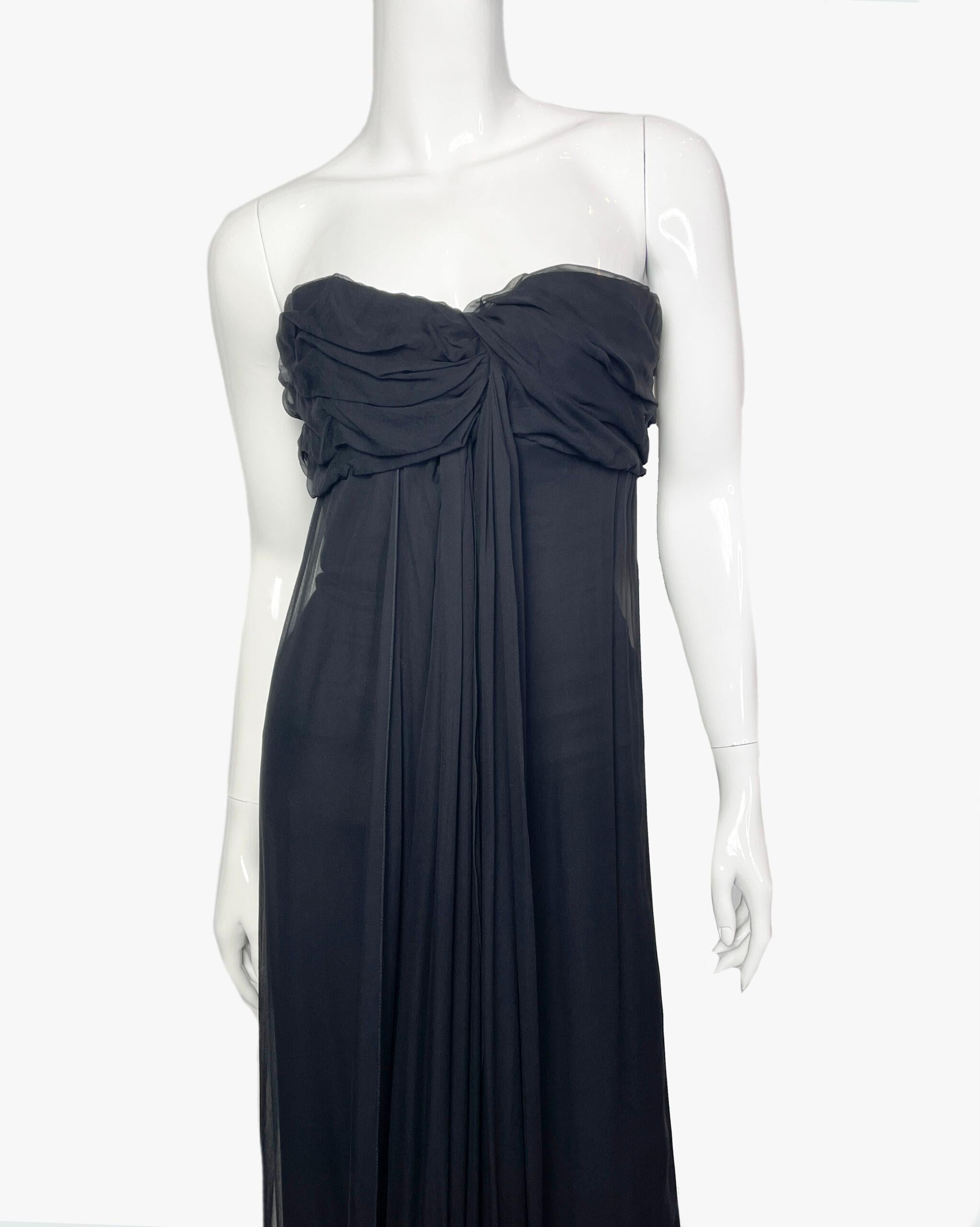 Vintage Yves Saint Laurent silk bustier dress with draping on the chest. The perfect dress for an evening out. 
The inner corset tightly fixes the bustier on the chest.
Fabric:  100% silk
Size: M
Condition: Perfect
