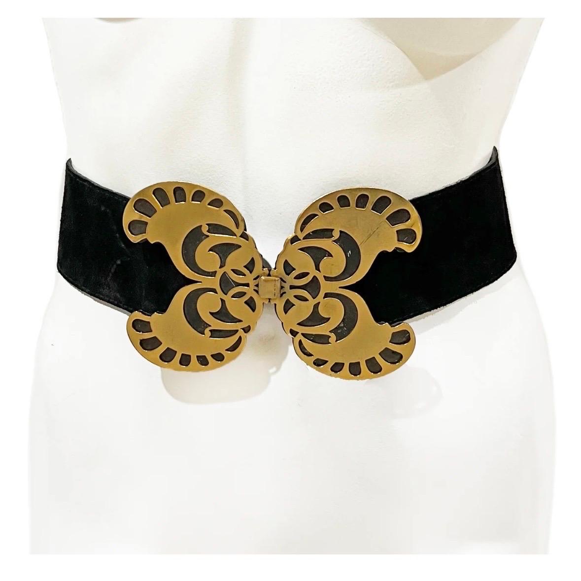Vintage butterfly belt by Yves Saint Laurent 
1970's 
Made in France 
Black Suede 
Gold tone metal oversized butterfly buckle 
Hook and eye closure 
YSL stamp on the back of buckle, as well as waist band
***SOLD AS IS*** significant leather