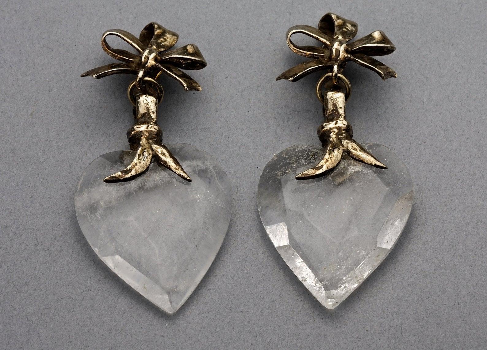 Vintage YVES SAINT LAURENT by Robert Goossens Bow Glass Heart Dangling Earrings

Measurements:
Height: 3.11 inches (7.9 cm)
Width: 1.38 inches (3.5 cm)
Weight: 23 grams

Features:
- 100% Authentic YVES SAINT LAURENT.
- Bow gilt metal with dangling