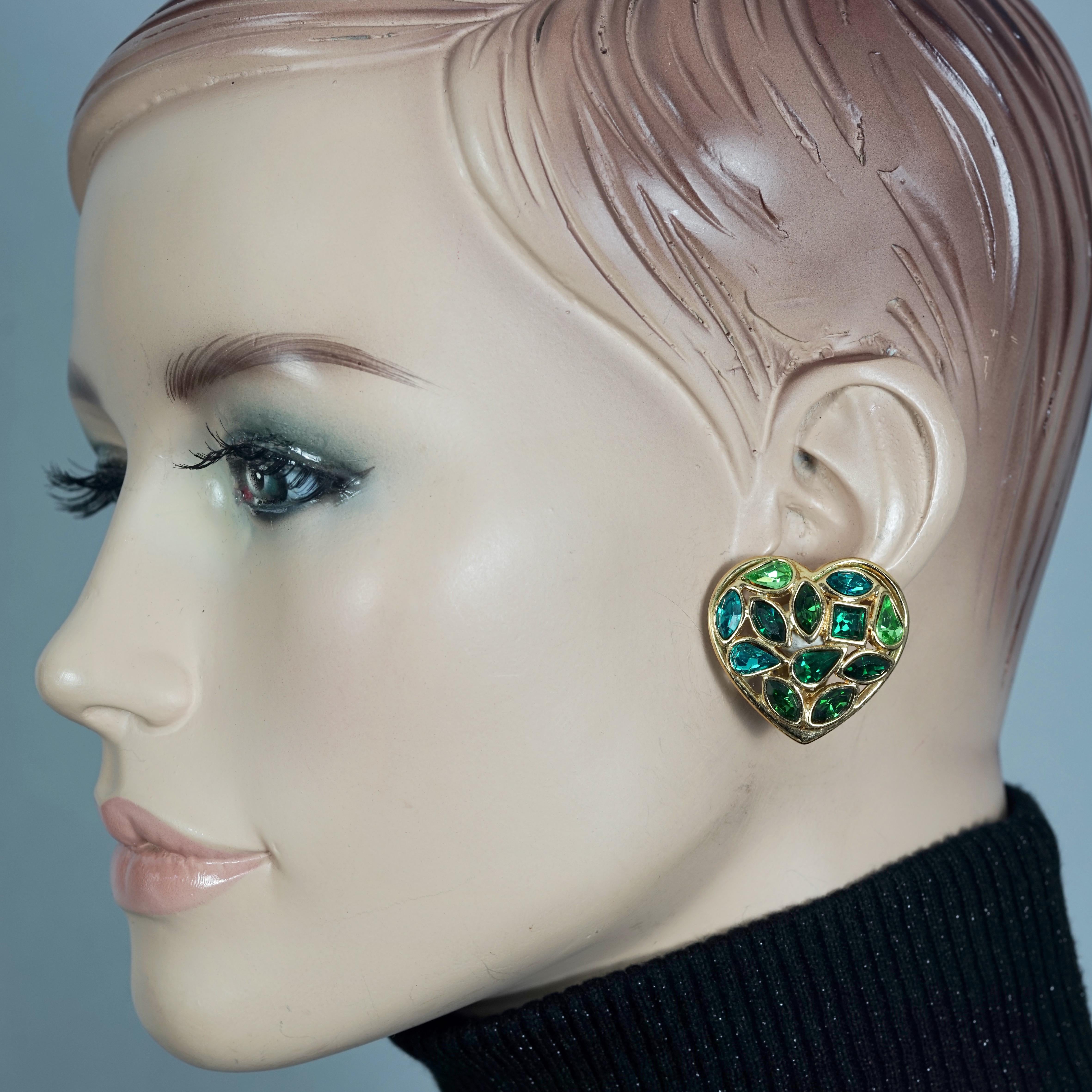 Vintage YVES SAINT LAURENT by Robert Goossens Green Heart Rhinestones Earrings

Measurements:
Height: 1.38 inches (3.5 cm)
Width: 1.26 inches (3.2 cm)
Weight per Earring: 13 grams

Features:
- 100% Authentic YVES SAINT LAURENT by Goossens.
- Heart