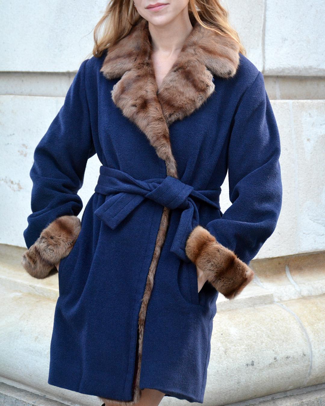 This vintage Yves Saint Laurent fur-trim coat was made in the 1980s by the house's fur label, YSL Fourrures. It's crafted of the softest cashmere wool— without even getting to the fur, it's already one of the softest and warmest cashmere blends I've