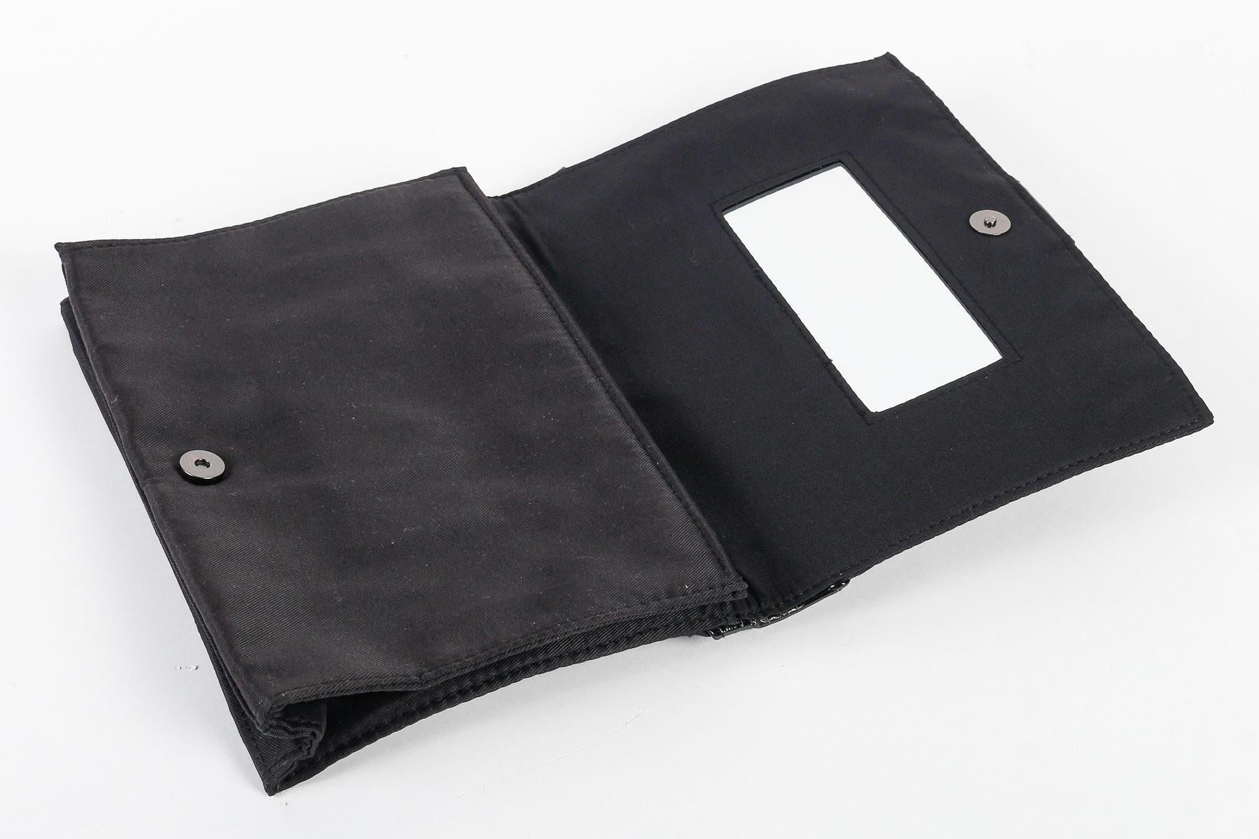 Vintage-Clutch von Yves Saint-Laurent, schwarzes Leder, 20. Jahrhundert. im Angebot 1