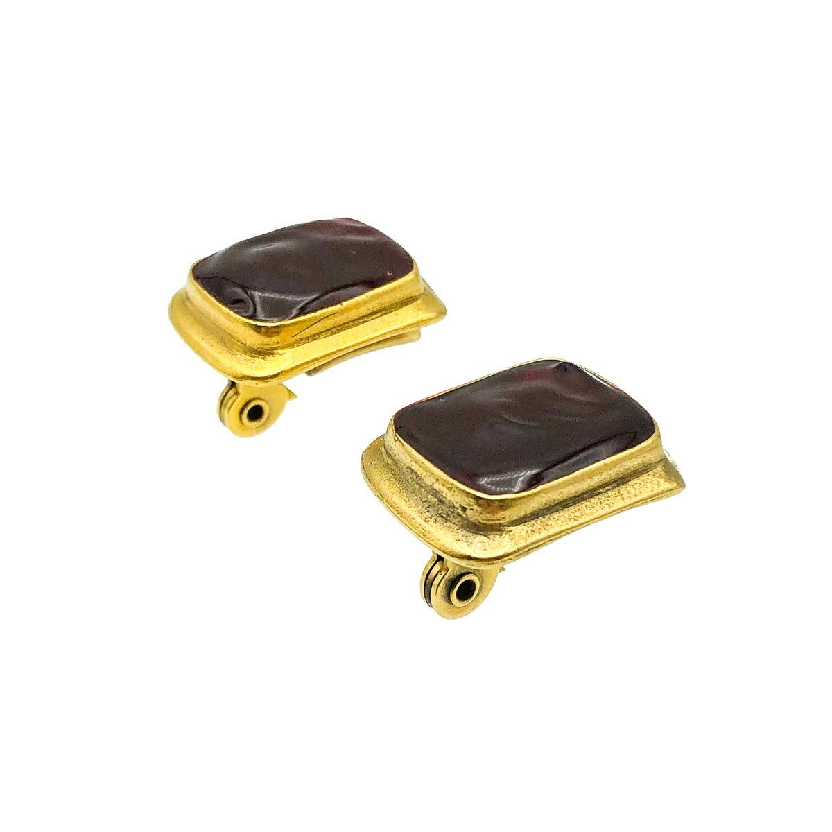 Vintage YSL pate de verre Earrings. Crafted in gold plated metal and set with stunning pate de verre or poured glass in a rich deep red jewel colour. In very good vintage condition. Signed. Approx. 2.3cms. A beautiful pair of jewel inspired clip ons