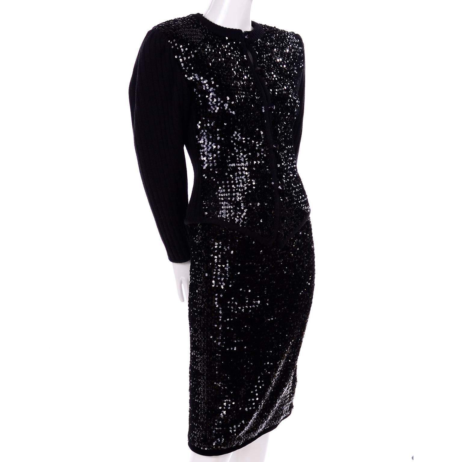 This is a wonderful Yves Saint Laurent 2 piece evening outfit that would make a great evening dress alternative. The early 1980's evening suit includes a beautiful knit sweater with a ribbed back and a heavily sequined front and a slim skirt covered