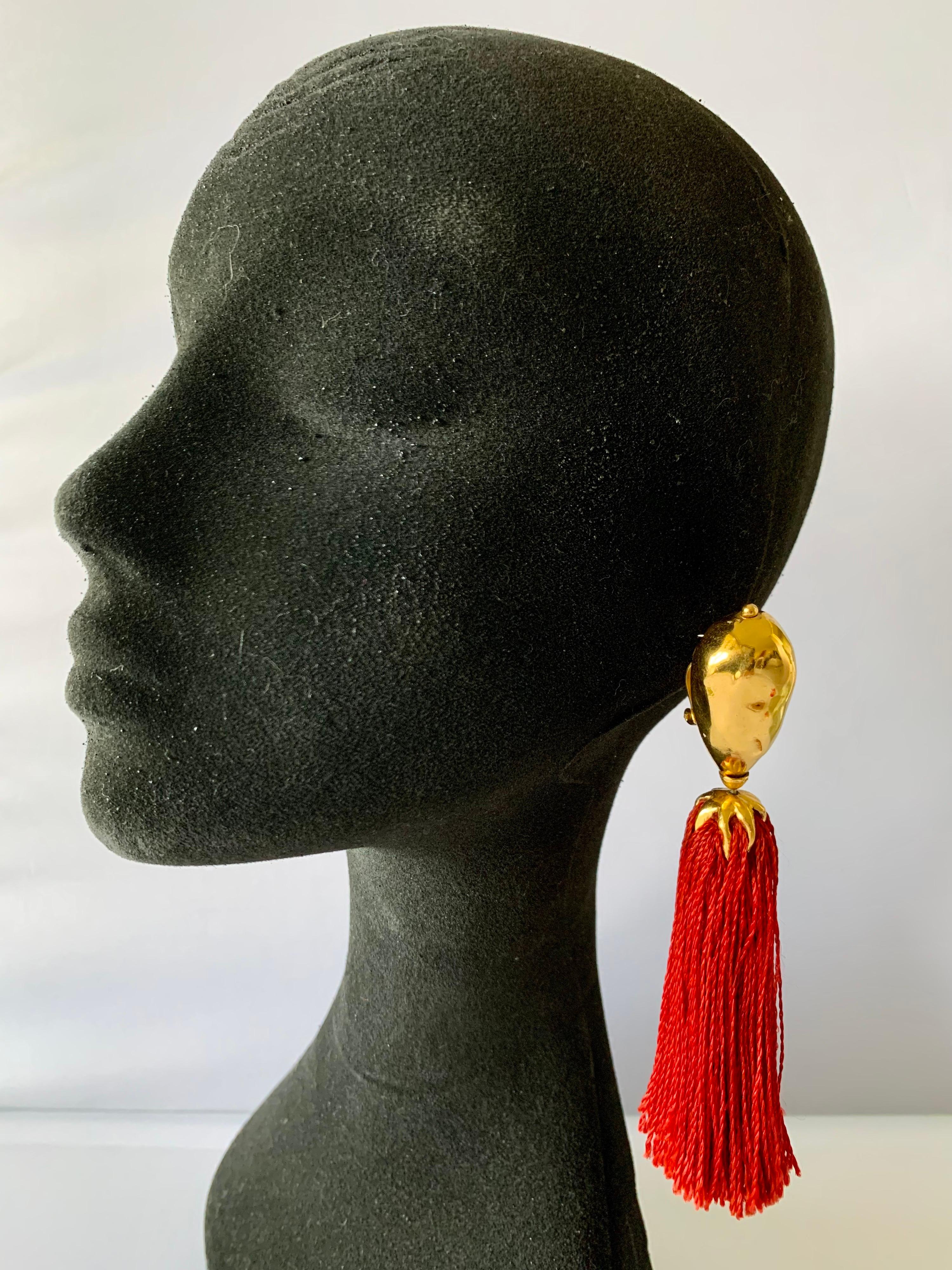 Vintage Yves Saint Laurent red silk tassel clip-on statement earrings by Maison Robert Goossens - comprised out of gilt metal featuring a flame design on top. 