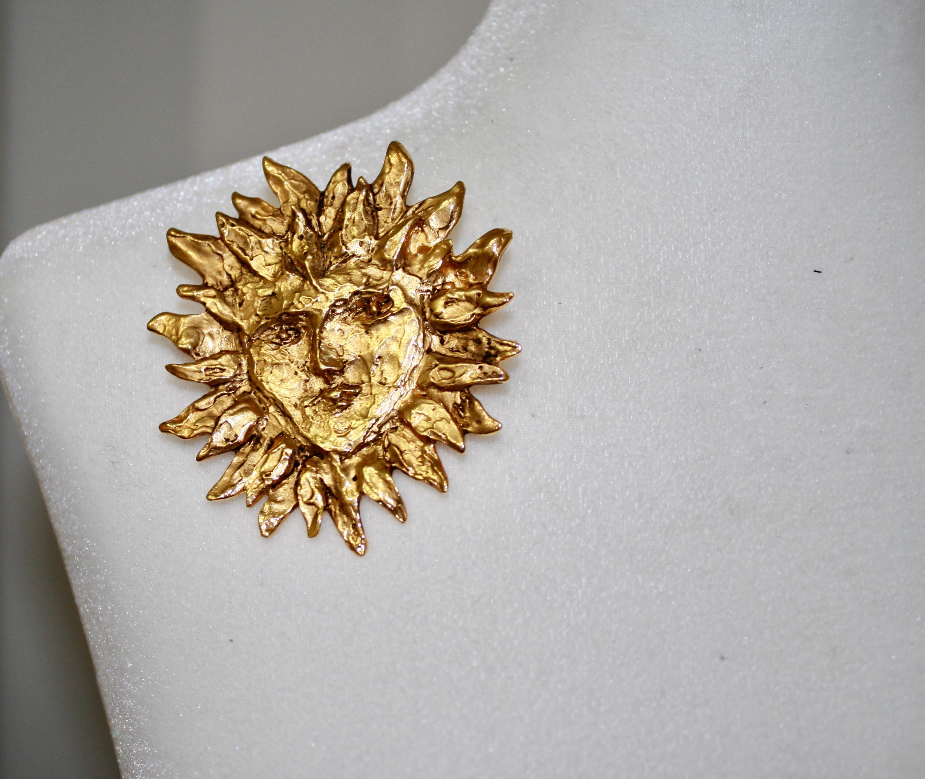 Vintage from the 80s made by Robert Goossens for YSL. 
Signed YSL in the back. Can be worn as a pendant as there is a hook. 24-carat gilded bronze.
Excellent condition.