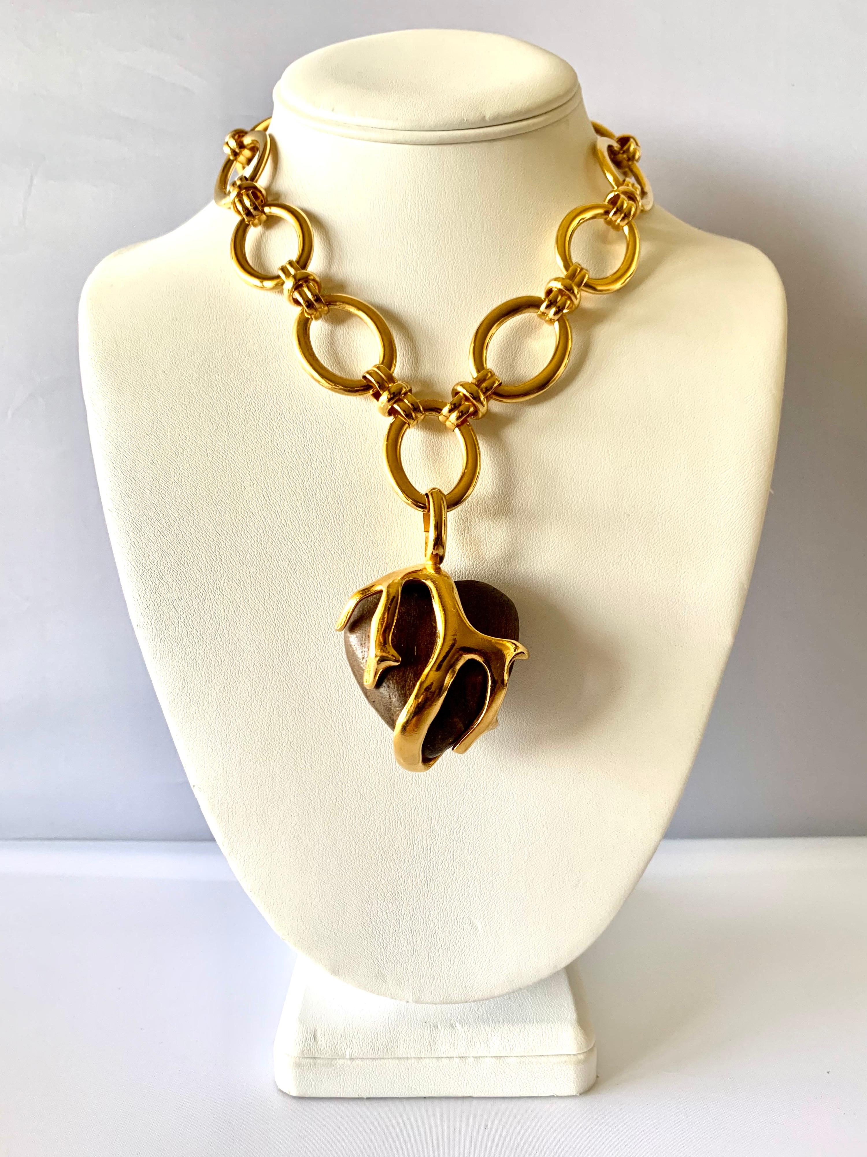 Scarce vintage Yves Saint Laurent heart-shaped pendant necklace comprised out of gilt metal 