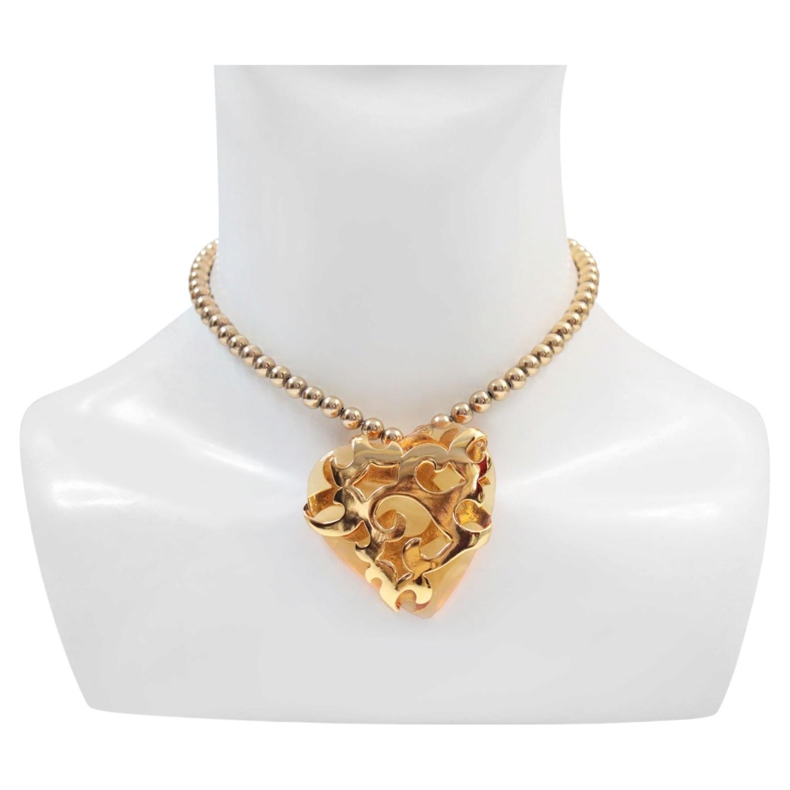 Collier vintage Yves Saint Laurent avec pendentif en forme de cœur, résine ambrée, années 1980