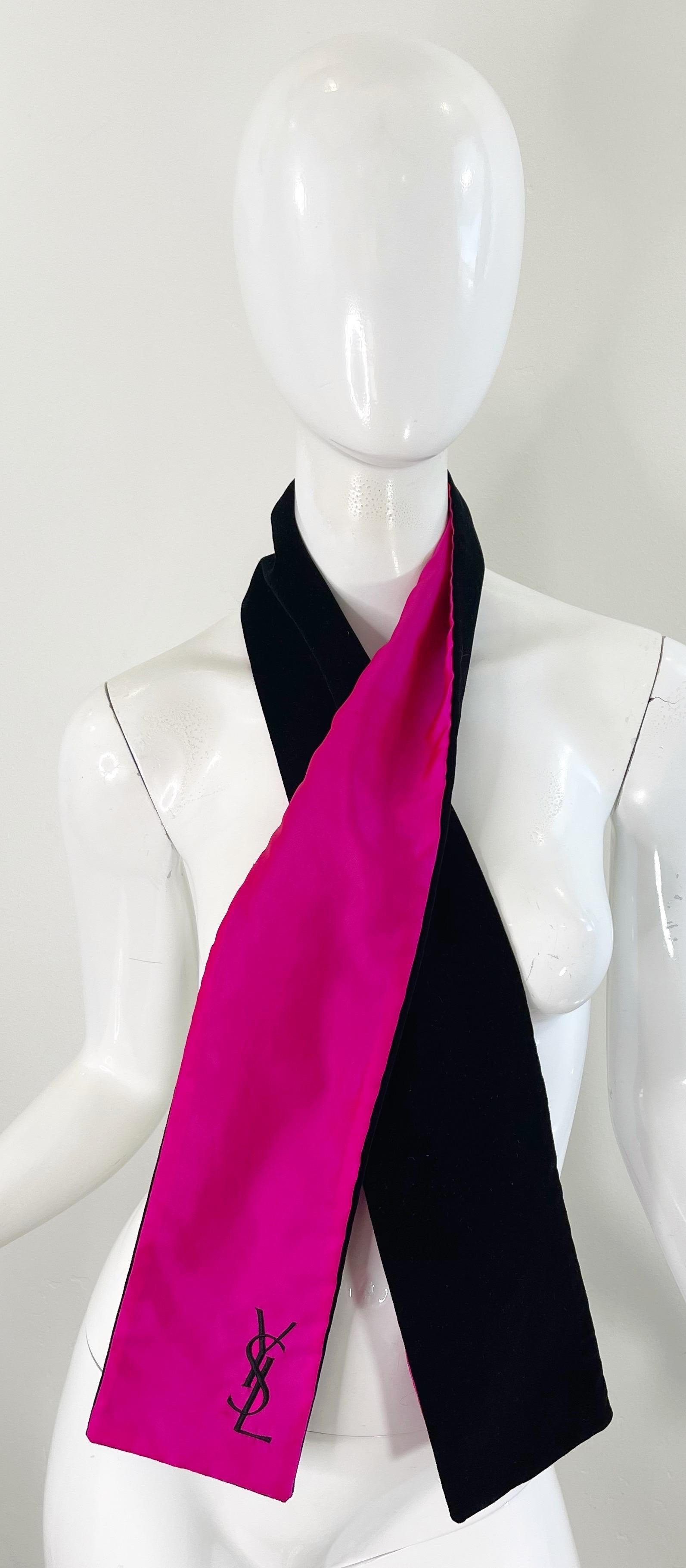Beautiful vintage YVES SAINT LAURENT reversible hot pink silk and black silk velvet stole. YSL embroidered on the pink side. Can be worn multiple ways.
In great condition 
Made in France
Measurements:
54 inches in length
4.5 inches in width 