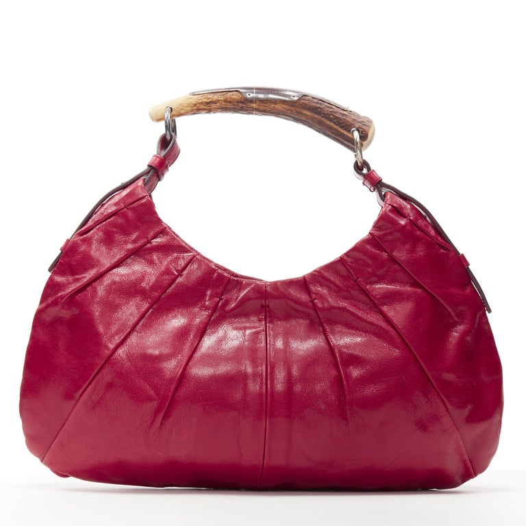 Sold at Auction: YVES SAINT LAURENT YSL Ivory Mala Mala Horn Bag
