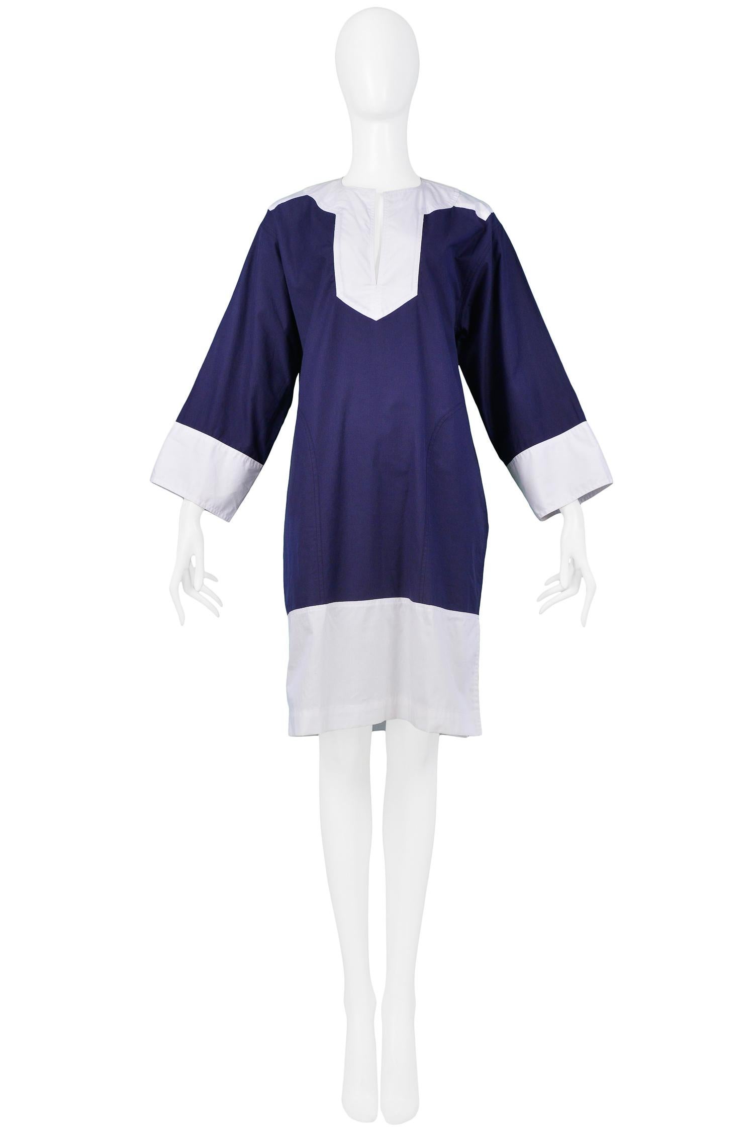 Vintage navy blue and white Yves Saint Laurent cotton nautical-inspired day dress with middy collar, straight but easy body, and contrasting cuffs and hem. 

Excellent original condition. Appears unworn. 

Size 36

Measurements: 
Bust 42