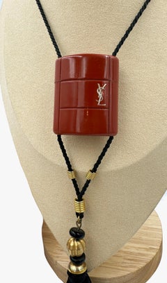 Vintage Yves Saint Laurent Opium perfume pendant necklace, 1970s