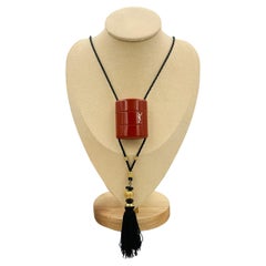 Vintage Yves Saint Laurent Opium perfume pendant necklace, 1970s
