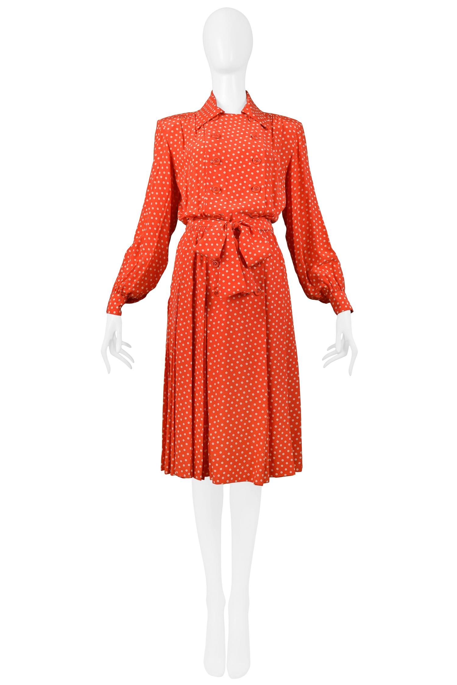 Resurrection Vintage is excited to offer a vintage red and white polka dot Yves Saint Laurent silk day dress with front pleats, double-breasted bodice, and belt.

Yves Saint Laurent
Size 40
Measurements: Bust 42”, Waist 28”, Hips 40”. Measurements: