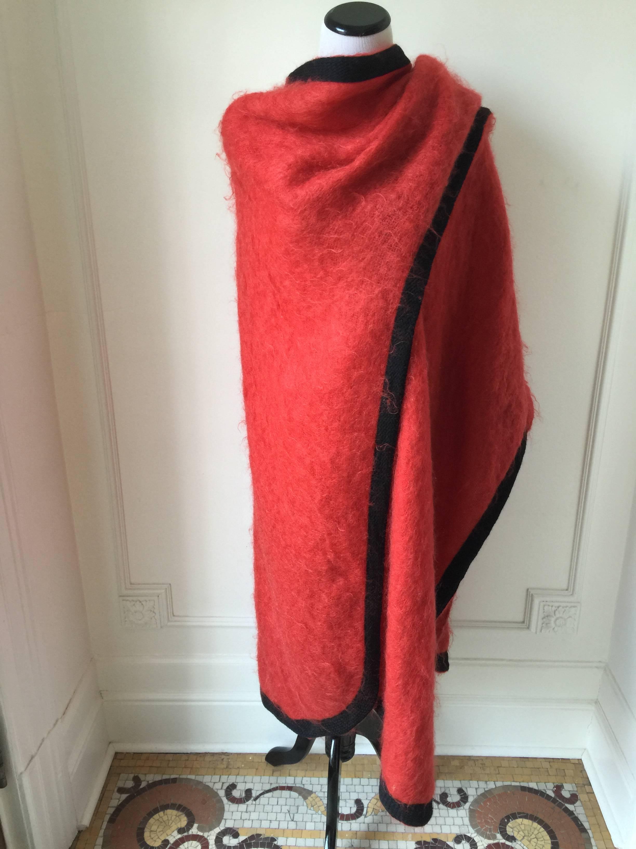 Stunning red opera cape, from the Russian Collection. 
Make an entrance.
Trimmed with intricate black trim..YSL signature red colour.