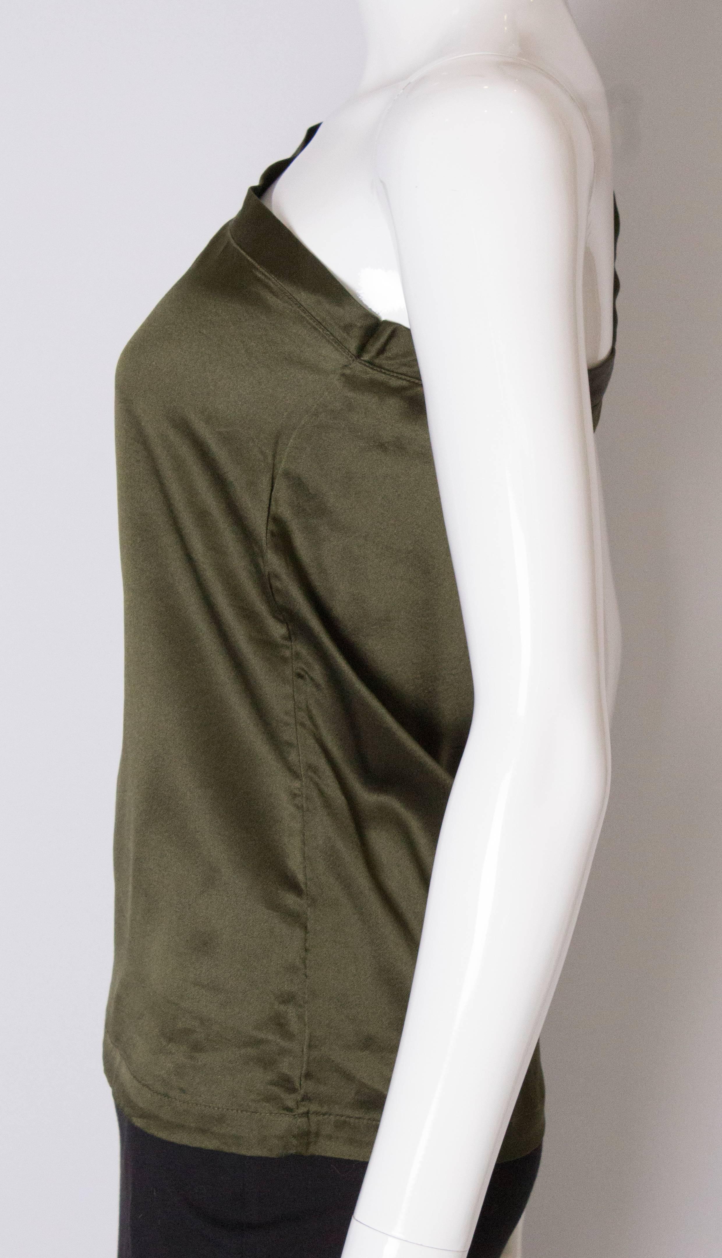 A Vintage 1990s olive green one shoulder silk top  by Yves Saint Laurent 1