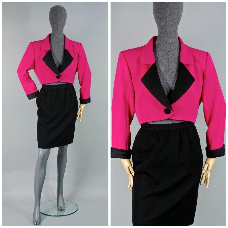 Vintage YVES SAINT LAURENT Rive Gauche Spencer Jacket Skirt Smoking Suit

Measurements taken laid flat, please double bust, wast and hips:
BLAZER/ BLOUSE
Shoulder: 16.92 inches (43 cm)
Sleeves: 21.65 inches (55 cm)
Bust: 20.07 inches (51 cm)
Waist: