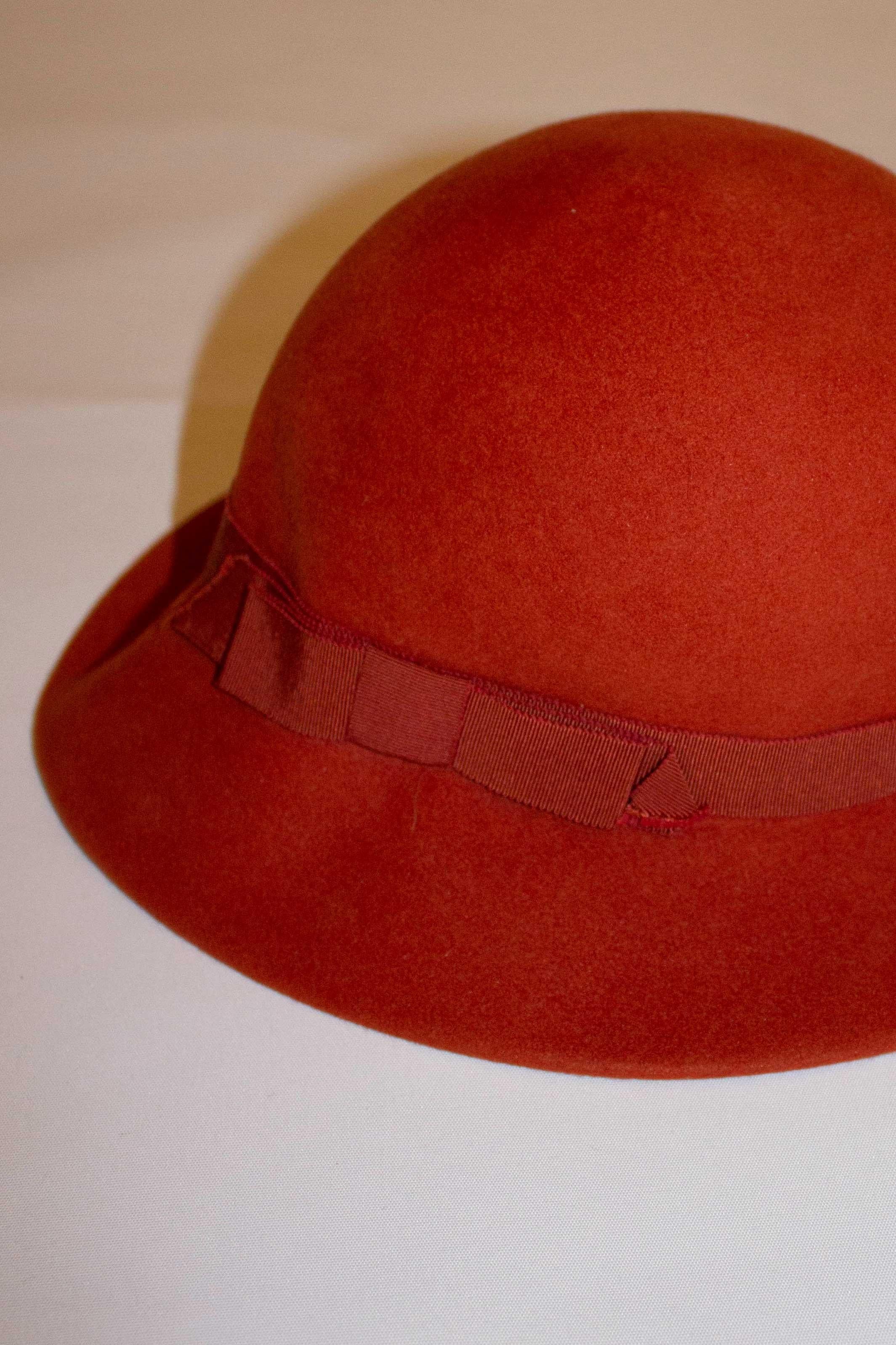 Women's or Men's Vintage Yves Saint Laurent Rust Wool Hat with Ribbon Detail For Sale