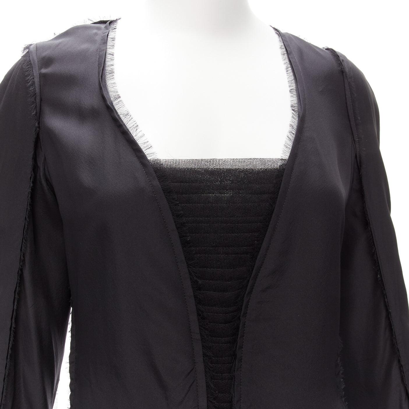 vintage YVES SAINT LAURENT TOM FORD black silk pleated mesh fringe trim top FR40
Reference: TGAS/A00338
Brand: Yves Saint Laurent
Model: Silk top
Collection: Fall Winter 2019
Material: Silk
Color: Black
Pattern: Solid
Closure: Zip
Extra Details:
