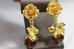 Vintage Yves Saint Laurent Vintage Gold Platedand glass pendant Flower Earrings