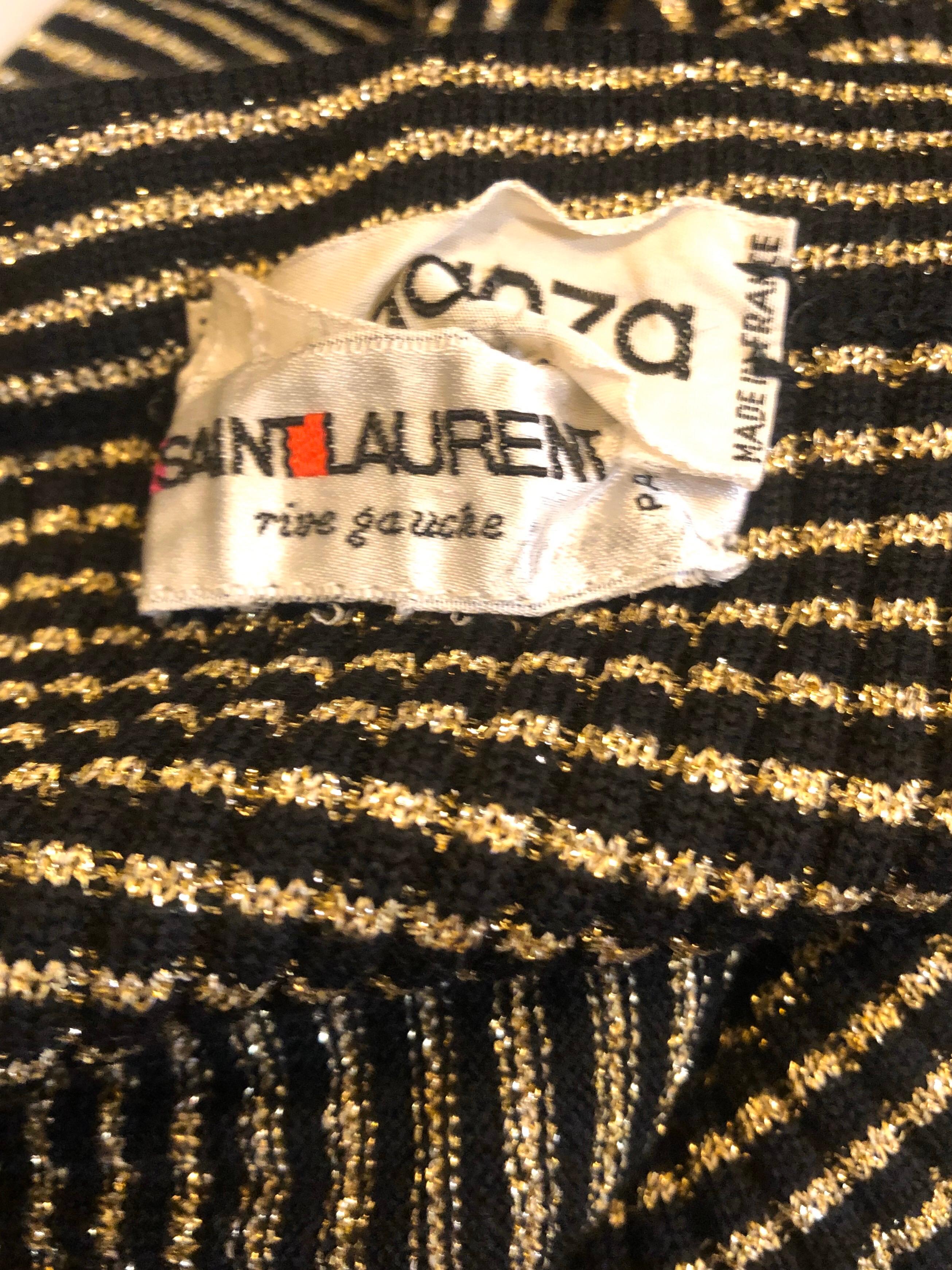 Fabulous 1970s YVES SAINT LAURENT Rive Gauche metallic gold and black striped knit strapless dress or maxi skirt! Soft stretchy knit material has a lot of give, so this can literally fit nearly any size. Simply slips on and stretches to fit. Can