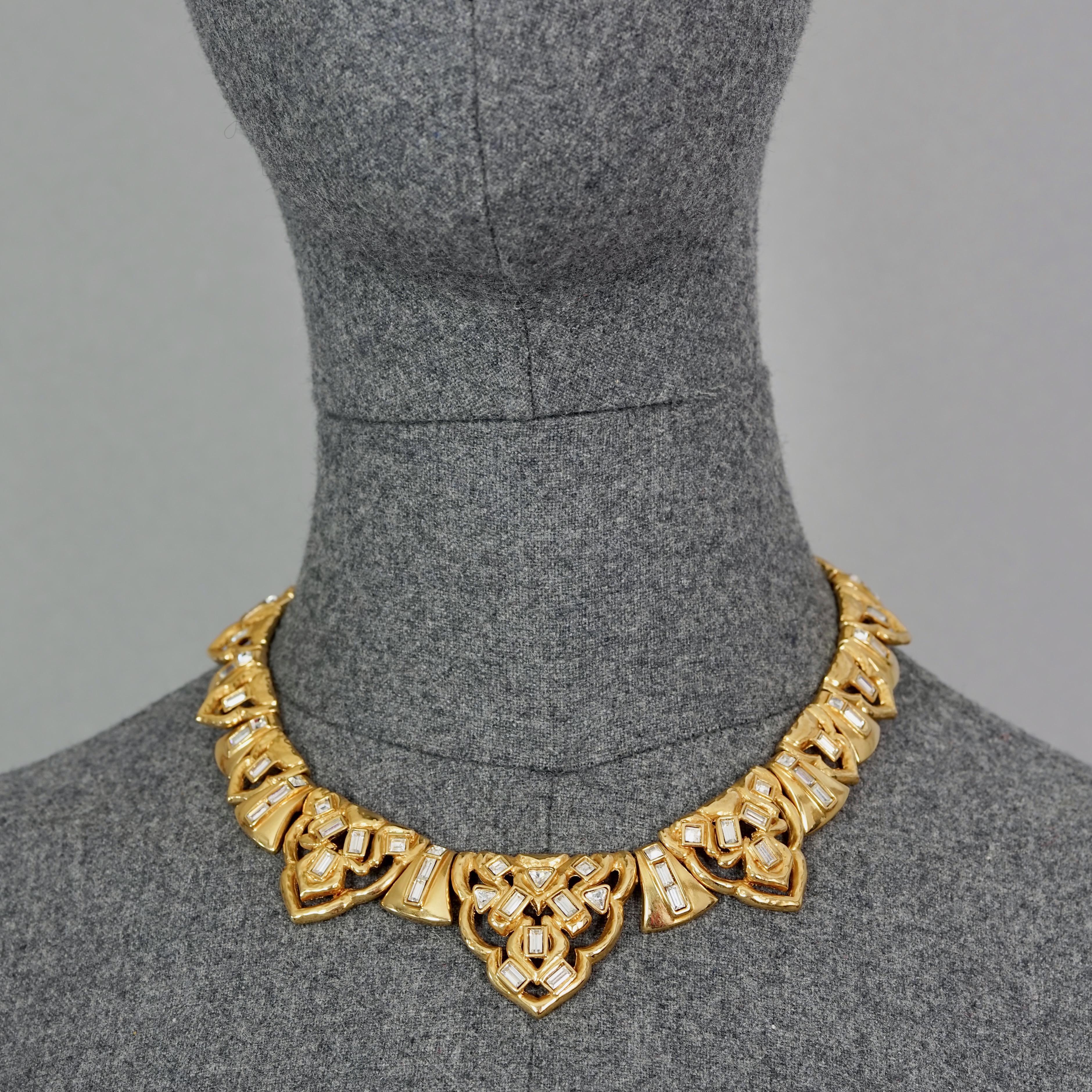Vintage YVES SAINT LAURENT Ysl Art Deco Rhinestone Link Necklace

Measurements:
Pendant: 1.38 inches (3.5 cm)
Wearable Length: 13.77 inches to 15.55 inches (35 cm to 39.5 cm)

Features:
- 100% Authentic YVES SAINT LAURENT.
- Art Deco style link