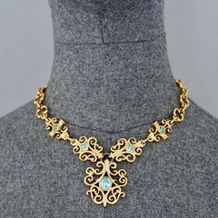 Collier vintage Yves Saint Laurent YSL « Baroque Link » bleu à strass