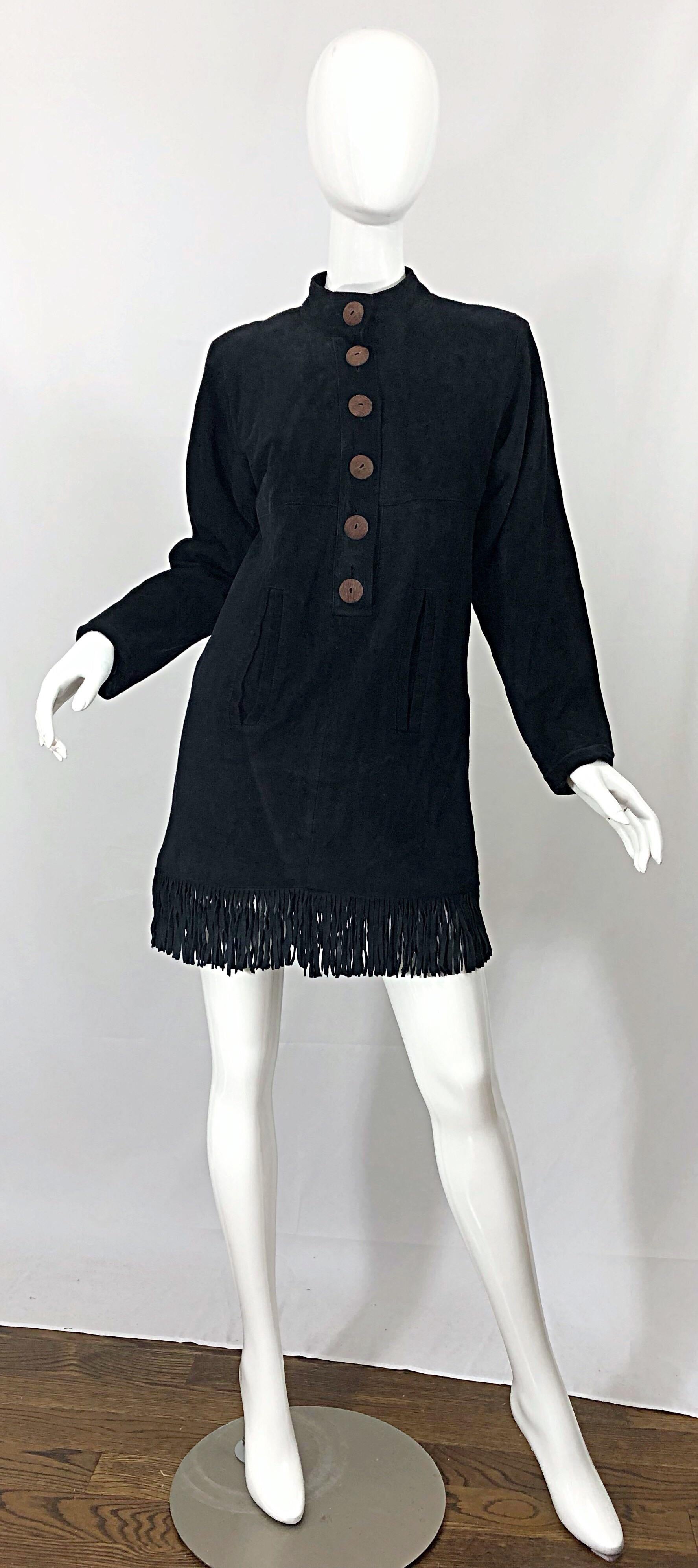 Fabulous vintage 1990s YVES SAINT LAURENT ( YSL ) Rive Gauche black suede nehru style fringed tunic dress! Features six large wood buttons up the front. Pockets at each side of the waist. Luxurious suede that will last forever! Fully lined. Great