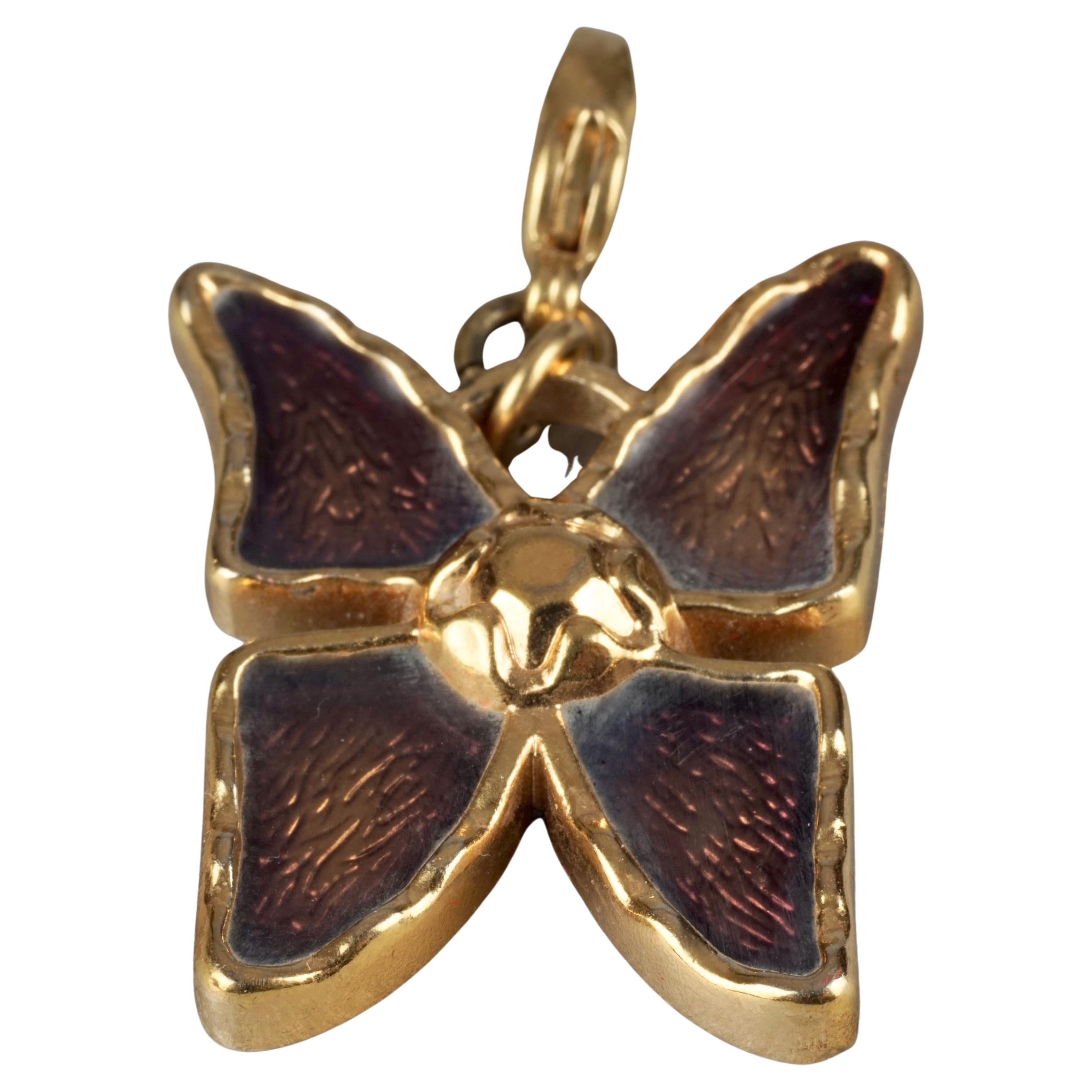 Vintage YVES SAINT LAURENT Ysl Butterfly Enamel Charm Pendant Necklace

Measurements:
Height: 1.30 inches (3.3 cm)
Width: 1.06 inches (2.7 cm)

Features:
- 100% Authentic YVES SAINT LAURENT.
- Brown enamel butterfly charm/ pendant necklace.
-