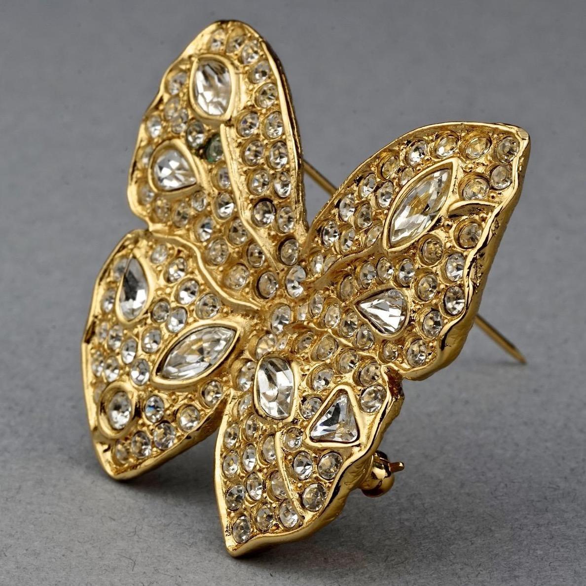 Vintage YVES SAINT LAURENT Ysl Butterfly Rhinestone Brooch

Measurements:
Height: 1.65 inches (4.2 cm)
Width: 1.81 inches (4.6 cm)

Features:
- 100% Authentic YVES SAINT LAURENT.
- Butterfly brooch studded with rhinestones.
- Signed YSL Made in
