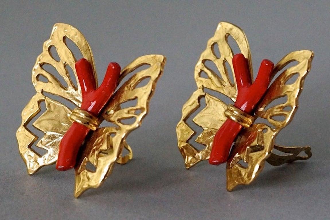 Vintage YVES SAINT LAURENT Ysl by Robert Goossens Butterfly Coral Branch Earrings

Measurements:
Height: 2.08 inches (5.3 cm)
Width: 2.04 inches (5.2 cm)
Weigh per Earring: 17 grams

Features:
- 100% Authentic YVES SAINT LAURENT by Robert