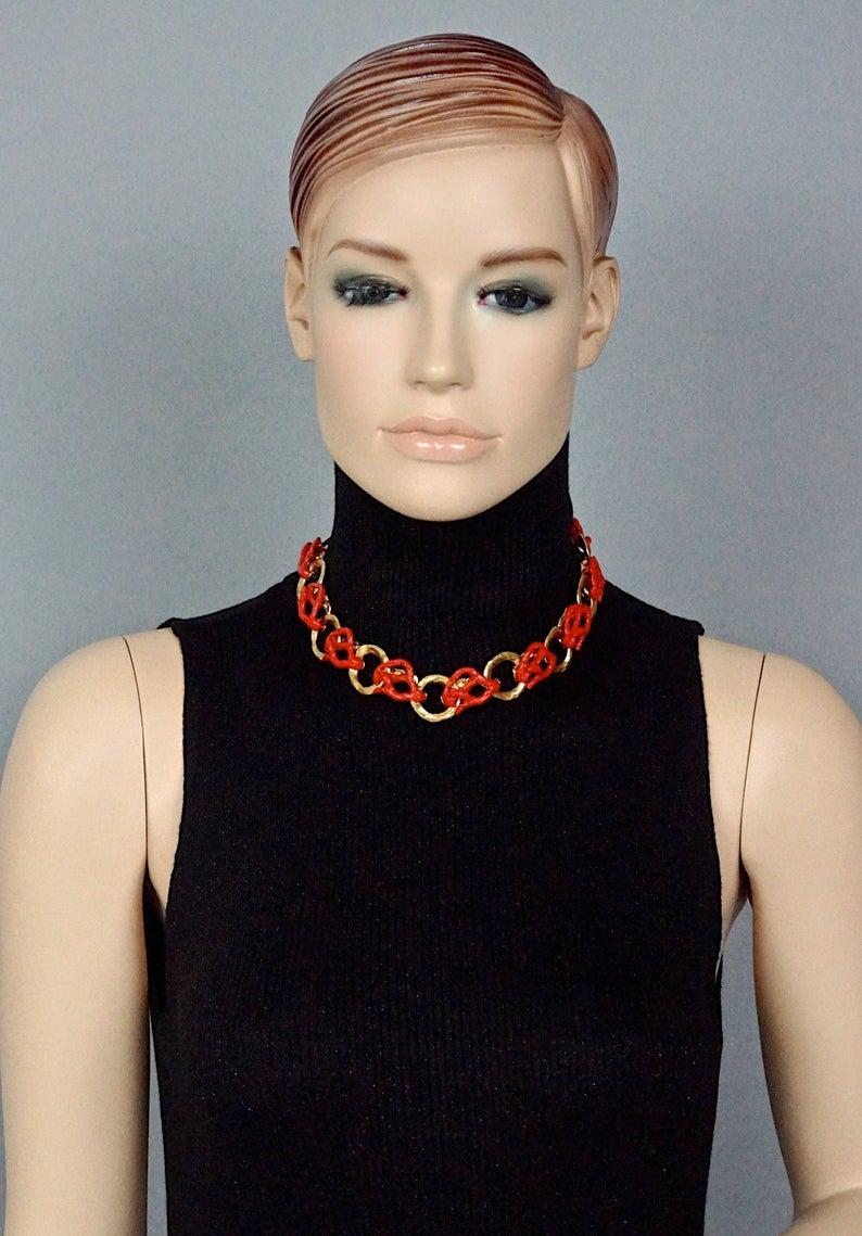 Vintage YVES SAINT LAURENT Ysl by Robert Goossens Coral Branch Overlay Chain Necklace

Measurements:
Height: 0.94 inch (2.4 cm)
Length: 16.73 inches to 18.70 inches (42.5 cm to 47.5 cm)

Features:
- 100% Authentic YVES SAINT LAURENT by Robert
