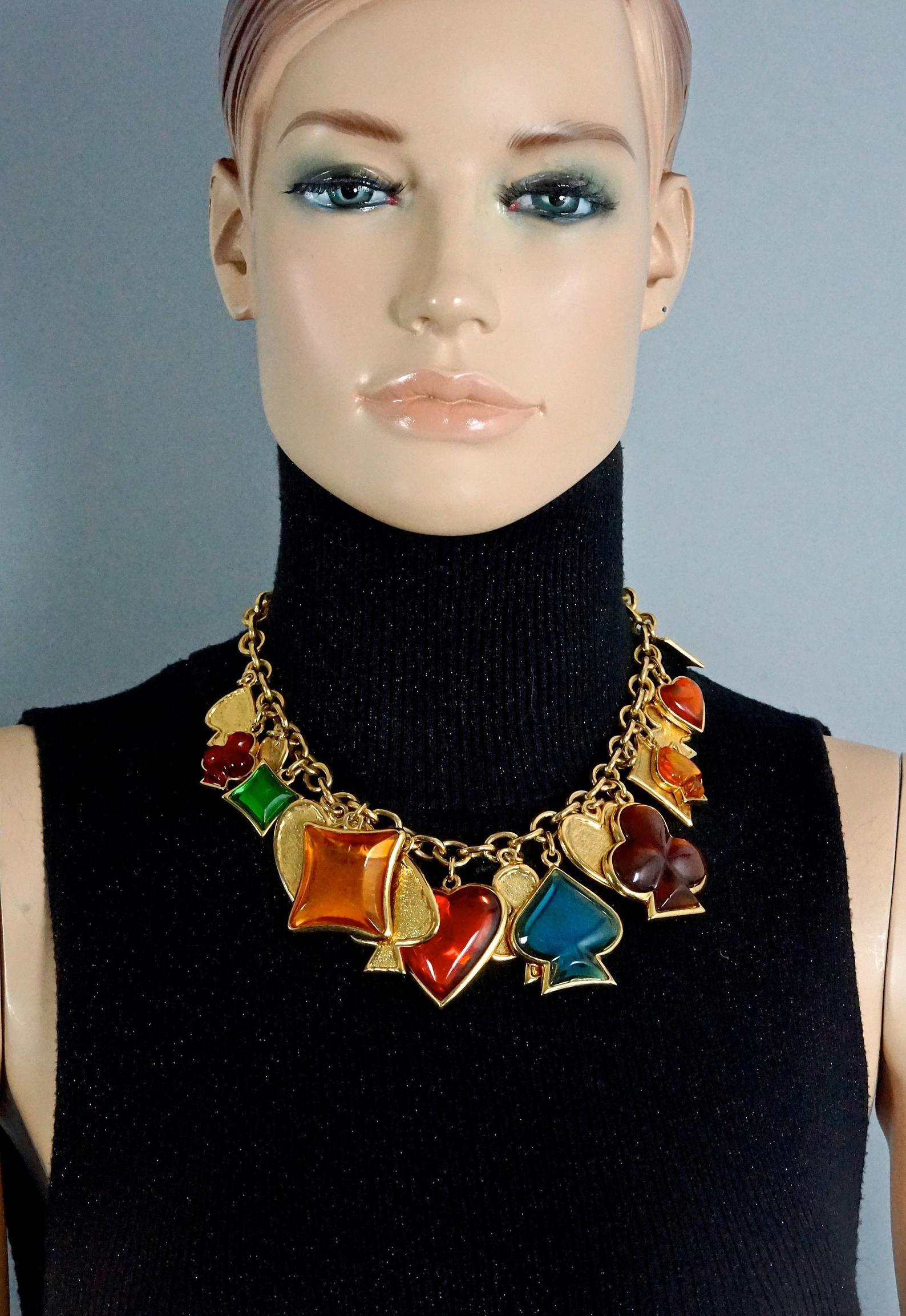 Vintage YVES SAINT LAURENT Ysl by Robert Goossens Playing Card Charm Necklace

Measurements:
Height: 2.16 inches (5.5 cm)
Wearable Length: 16.73 inches (42.5 cm) 

Features:
- 100% Authentic YVES SAINT LAURENT by Robert Goossens.
- Multi coloured