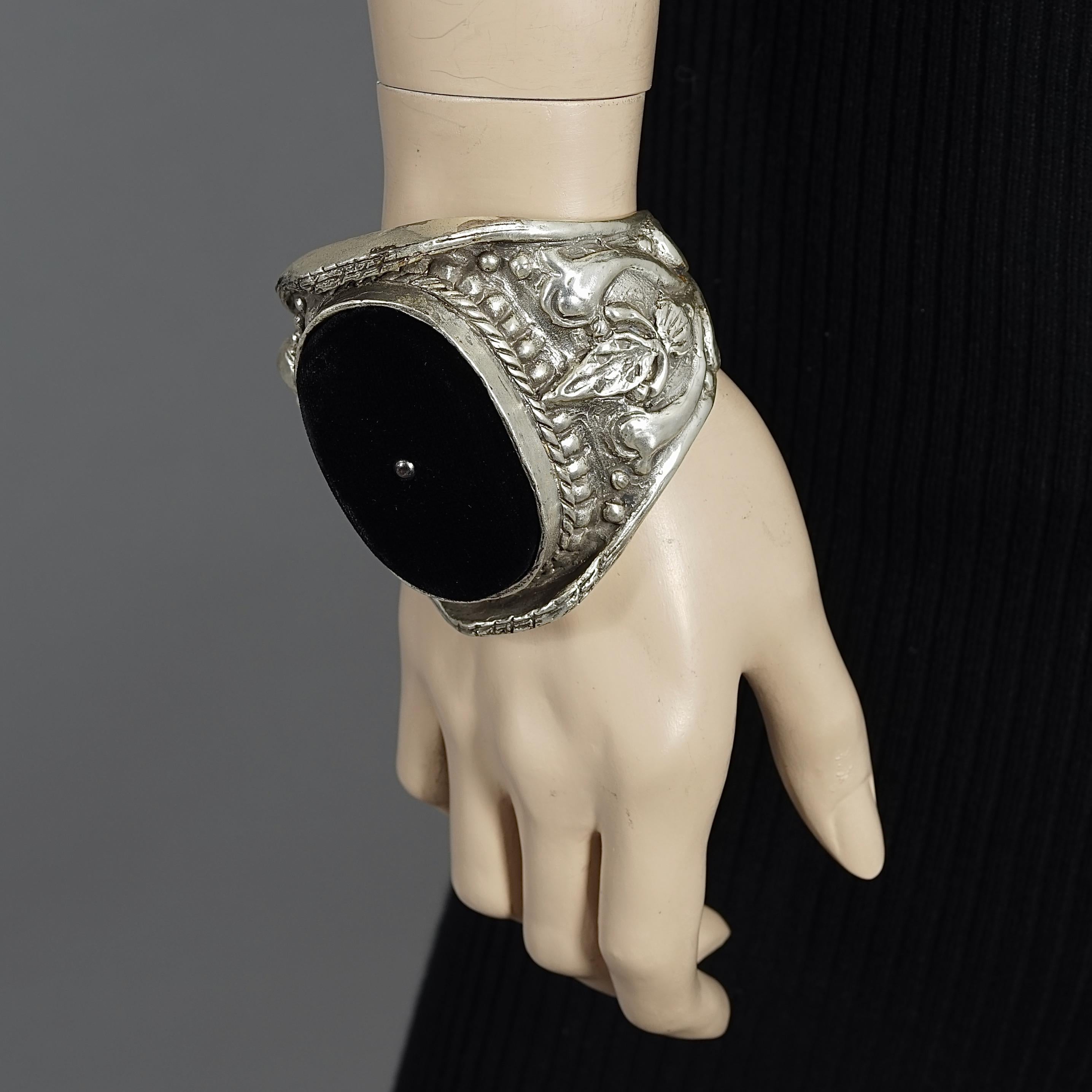 Vintage YVES SAINT LAURENT Ysl by Tom Ford Velvet Sterling Silver Cuff Bracelet
From 2002 Runway Collection

Approximate Measurements:
Height: 3 inches (7.6 cm)
Inner Circumference: 7.28 inches (18.5 cm) including the opening

Features:
- 100%