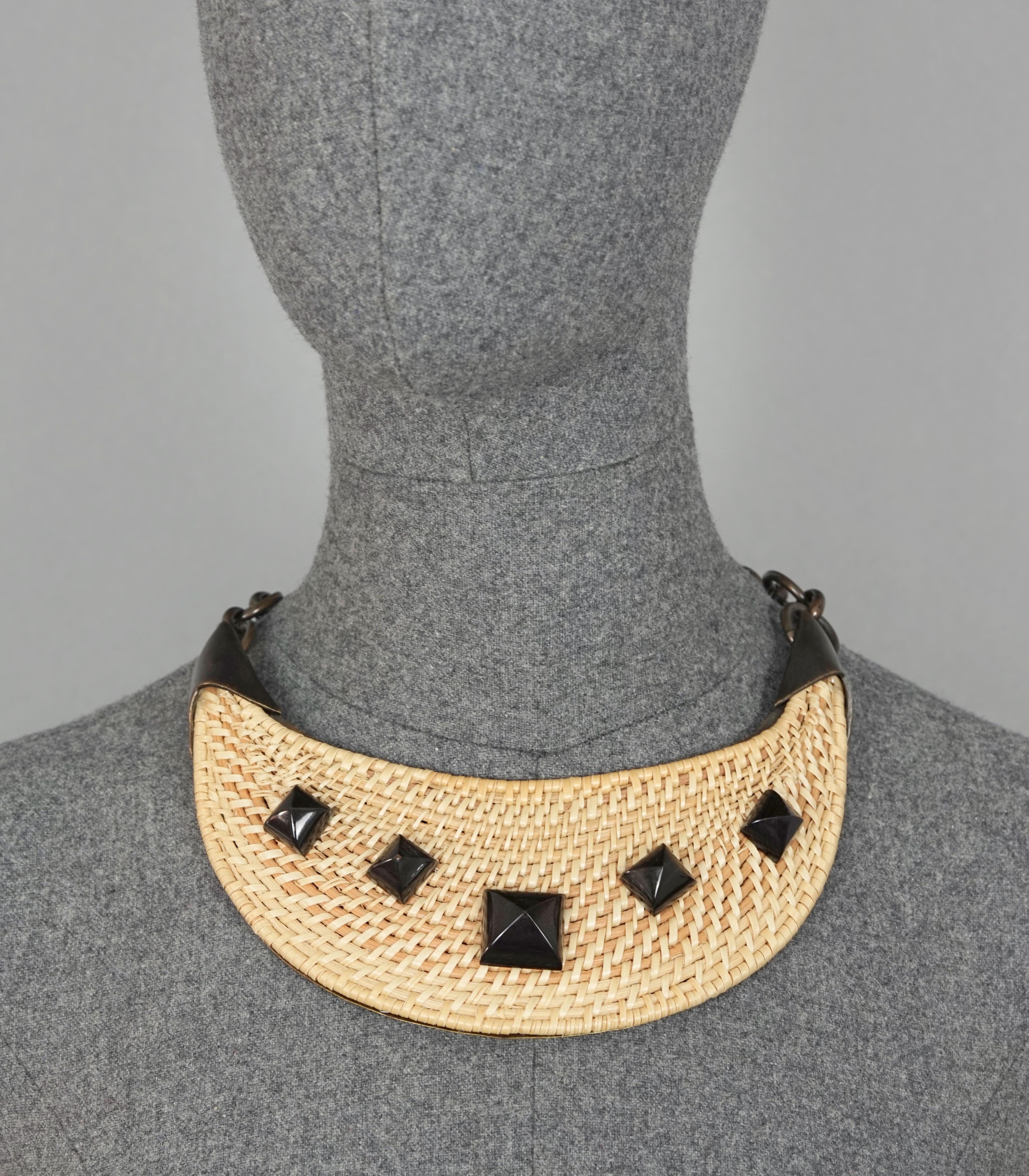 Vintage YVES SAINT LAURENT Ysl by Tom Ford Woven Raffia Bib Necklace

Measurements:
Height: 2.75 inches (7 cm)
Wearable Length: 18.11 inches (46 cm) maximum

Features:
- 100% Authentic YVES SAINT LAURENT by Tom Ford.
- Woven Raffia in natural colour