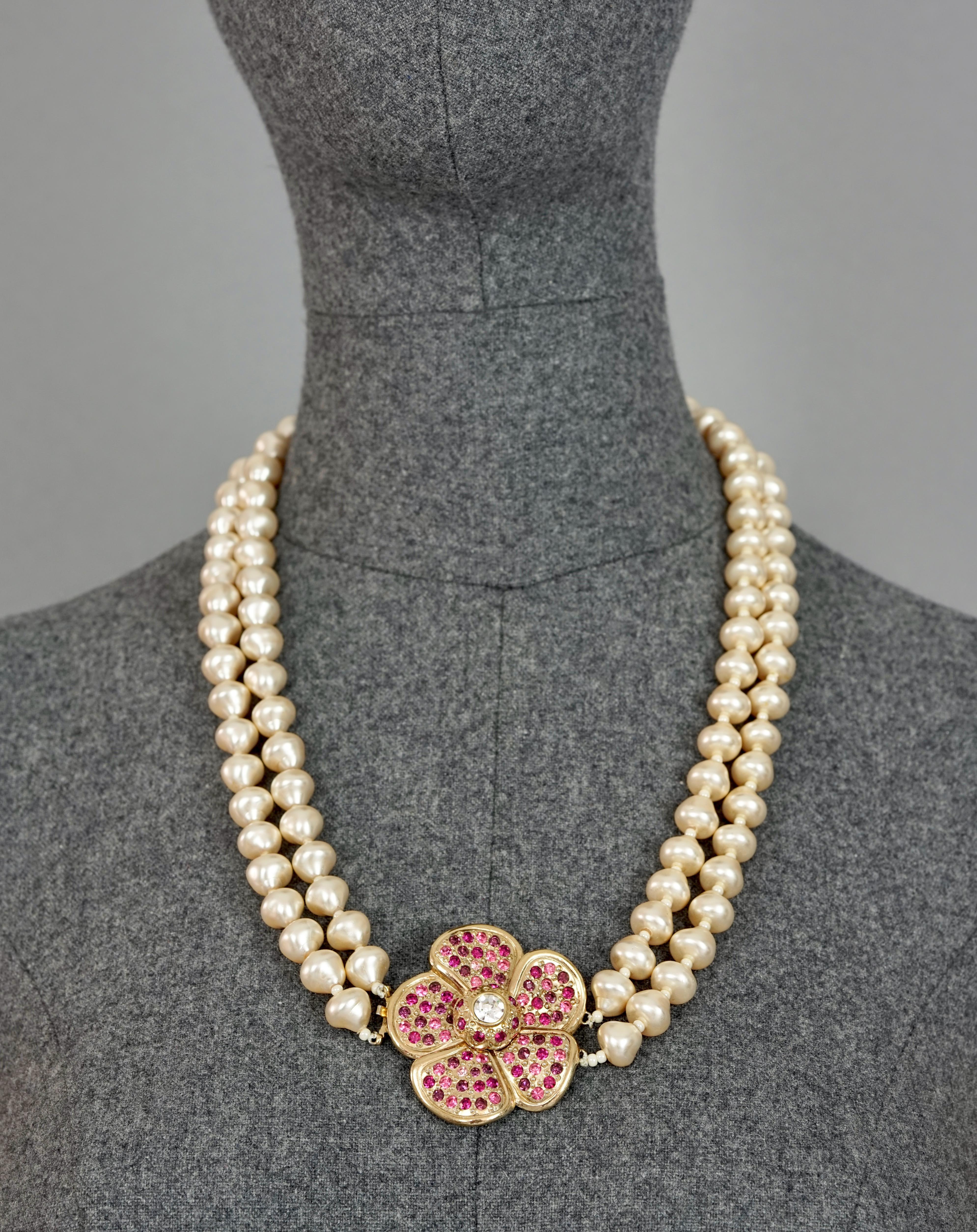 Vintage YVES SAINT LAURENT Ysl Flower Rhinestone Double Strand Pearl Necklace

Measurements:
Height: 1.92 cms (4.9 cm)
Width: 1.92 cms (4.9 cm)
Wearable Length: 24 inches (61 cm)

Features:
- 100% Authentic YVES SAINT LAURENT.
- Double strand pearl