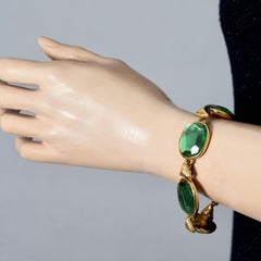 Bracciale vintage Yves Saint Laurent YSL con maglie geometriche e cabochon verdi