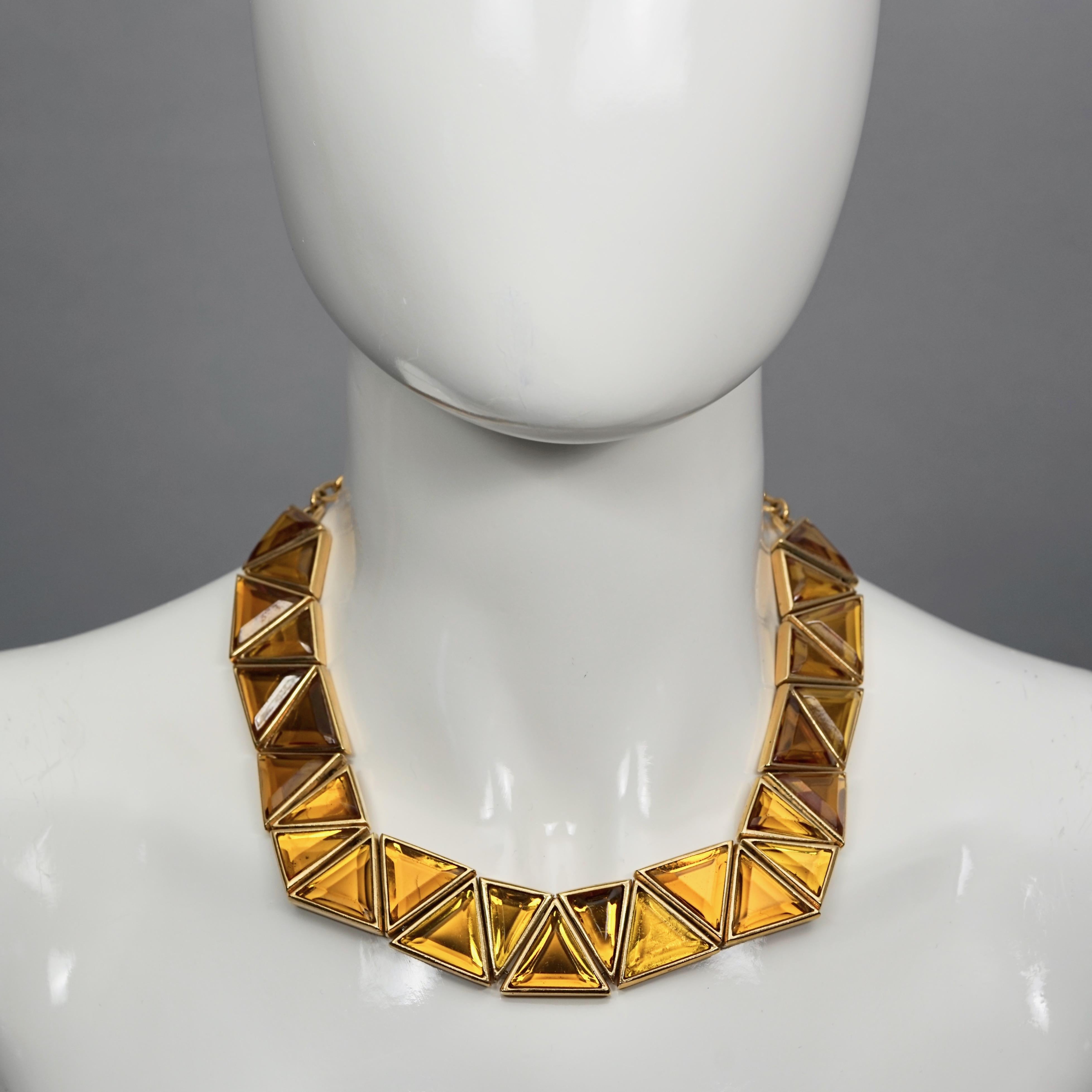 Vintage YVES SAINT LAURENT Ysl Geometric Resin Necklace by Robert Goossens

Measurements:
Height: 0.90 inch (2.3 cm)
Wearable Length: 14.17 inches to 17.32 inches (36 cm to 44 cm)

Features:
- 100% Authentic YVES SAINT LAURENT.
- Geometric resin in